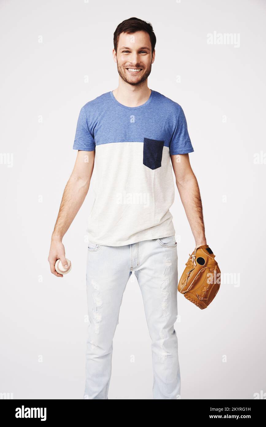 Er liebt Baseballspiele. Porträt eines jungen Mannes in Baseballkleidung. Stockfoto