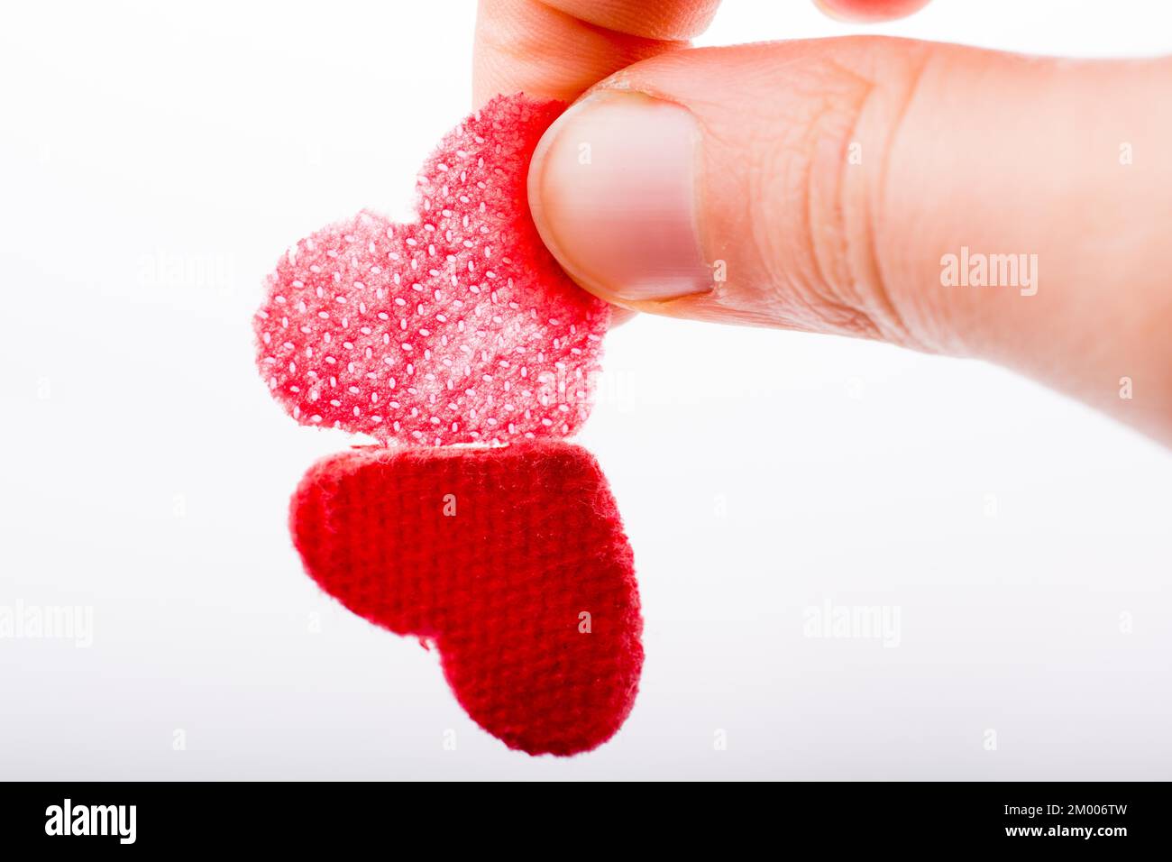 Herzförmige Objekt in der Hand auf Leinwand Stockfoto