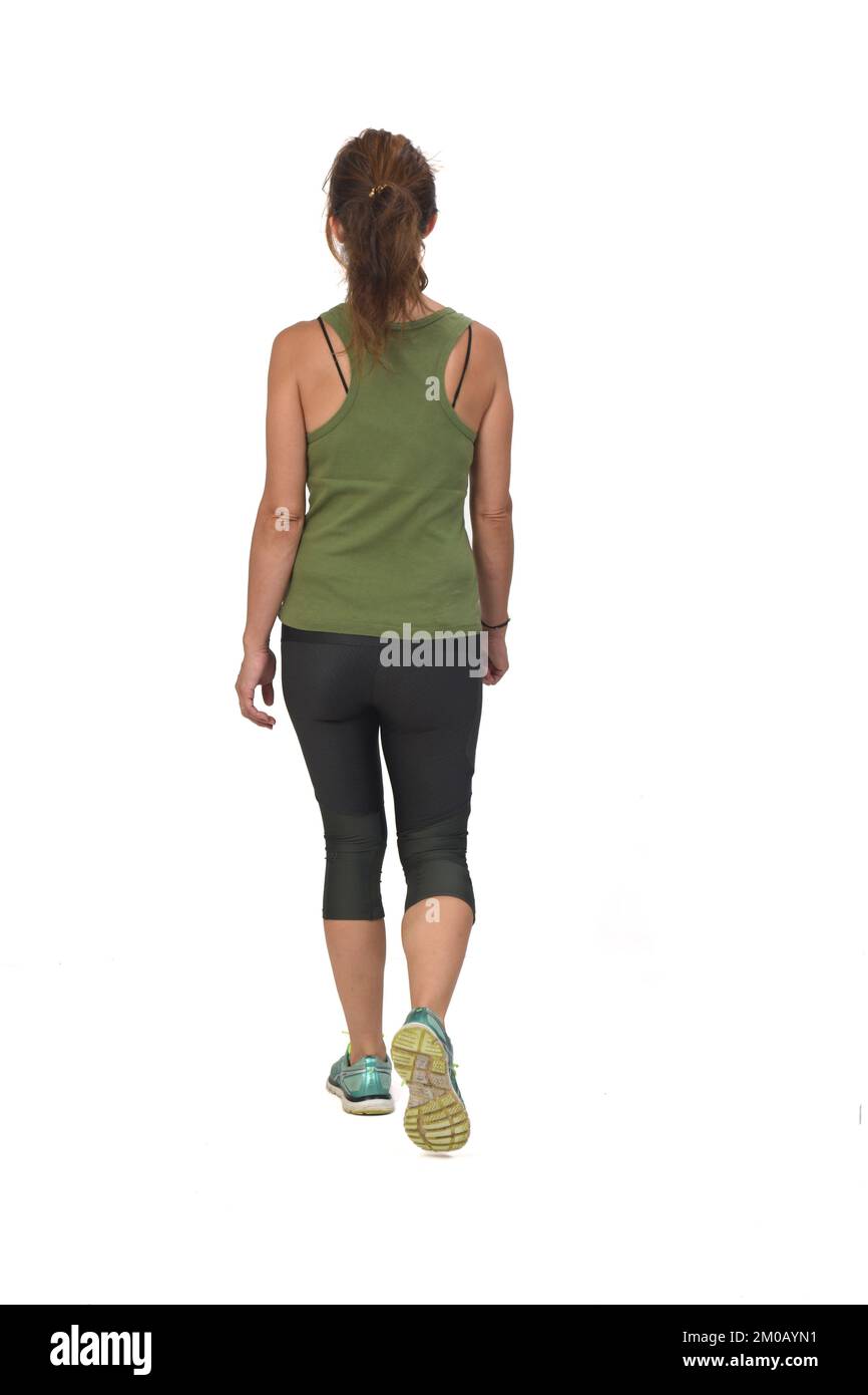 Rückansicht einer Frau mit Sportbekleidung, die auf weißem Hintergrund läuft, Stockfoto