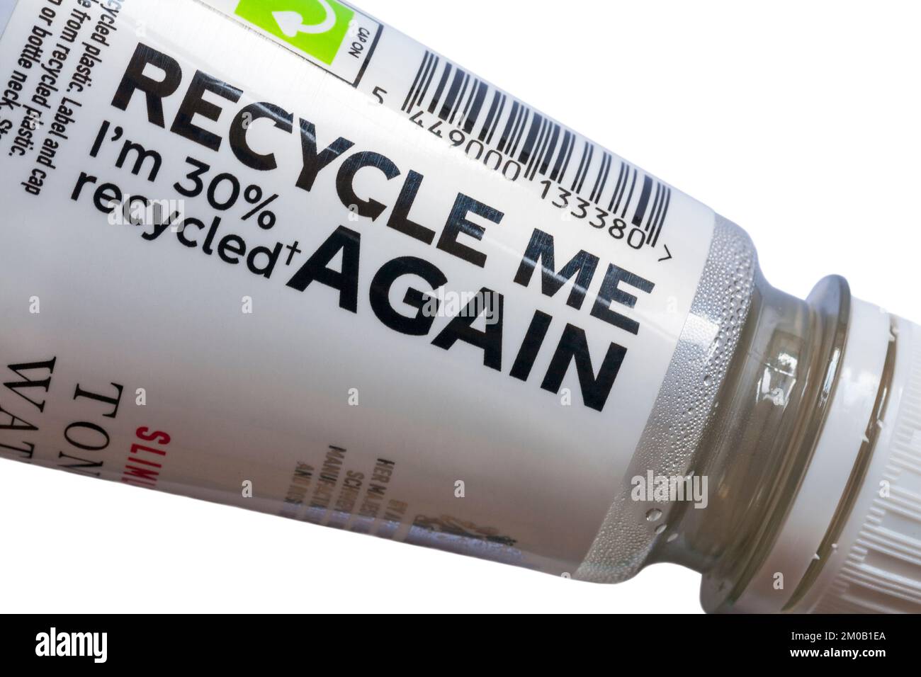 Wiederverwerten Ich bin zu 30 % recycelt - Details auf einer Flasche Schweppes Slimline Tonic Water Stockfoto