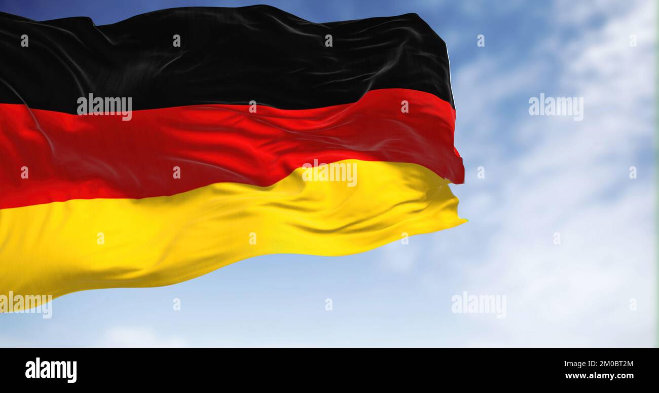 Die deutsche Nationalflagge weht im Wind an klaren Tagen. Die Bundesrepublik Deutschland ist ein Land in Mitteleuropa. Selektiver Fokus. abbildung 3D Stockfoto
