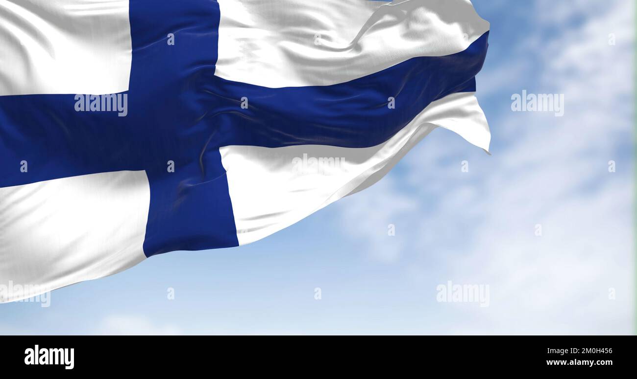Die finnische Nationalflagge weht im Wind an klaren Tagen. Die Republik Finnland ist ein nordisches Land in Nordeuropa. Selektiver Fokus. abbildung 3D Stockfoto