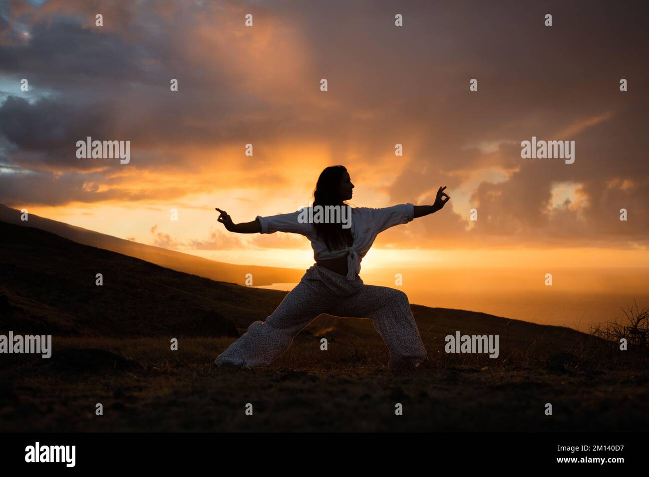 Sunrise und Yoga auf Hawaii Stockfoto
