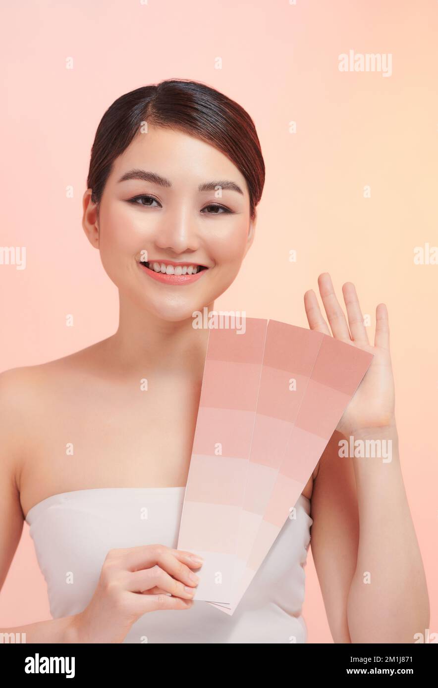 Beauty Woman asia Beauty und gebräunte Haut uv asia für Hintergrund pink Stockfoto