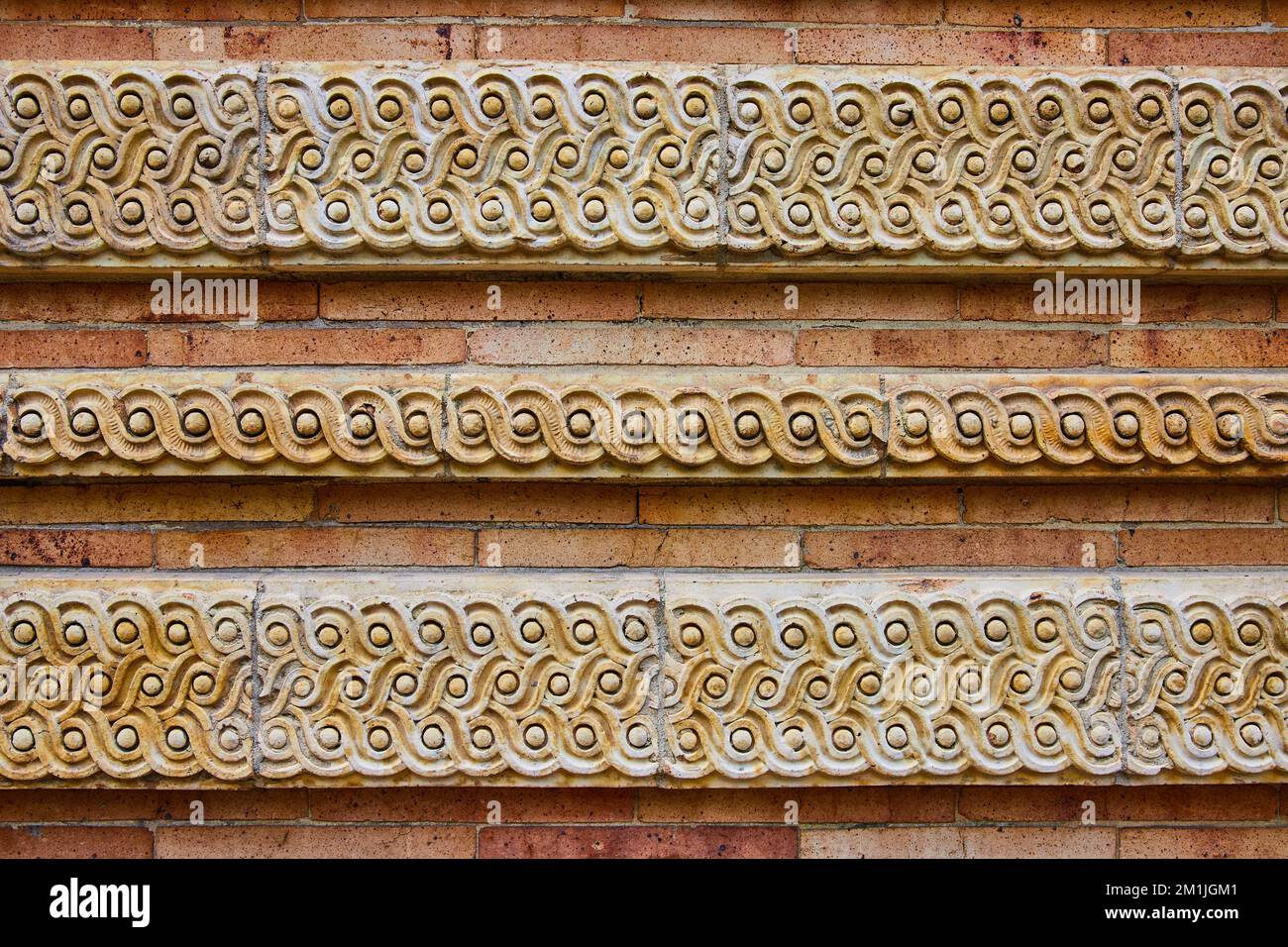 Gerade Texturdetails von Kalksteinarbeiten an der Wand Stockfoto