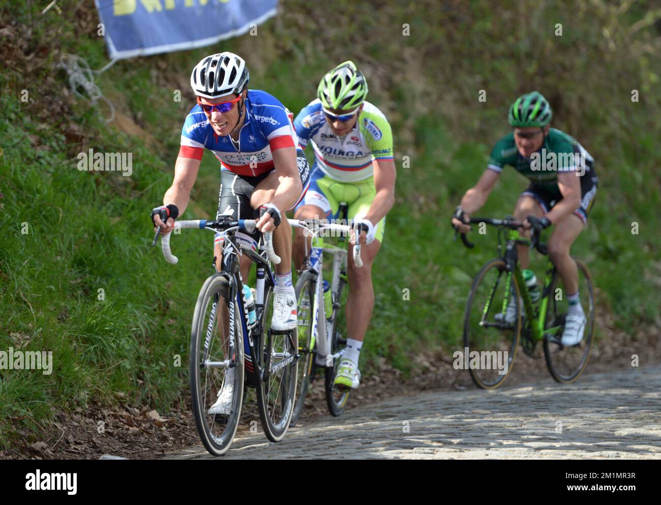 20120401 - KLUISBERGEN, BELGIEN: Französisches Sylvain Chavanel vom Team Omega Pharma - Quick Step, das auf dem Hügel Oude Kwaremont während der 96.. Ausgabe des eintägigen Radrennens „Ronde van Vlaanderen - Tour des Flandres - Tour of Flanders“, 255 km von Brügge nach Oudenaarde, Sonntag, 01. April 2012, in Kluisbergen abgebildet ist. BELGA FOTO YORICK JANSENS Stockfoto