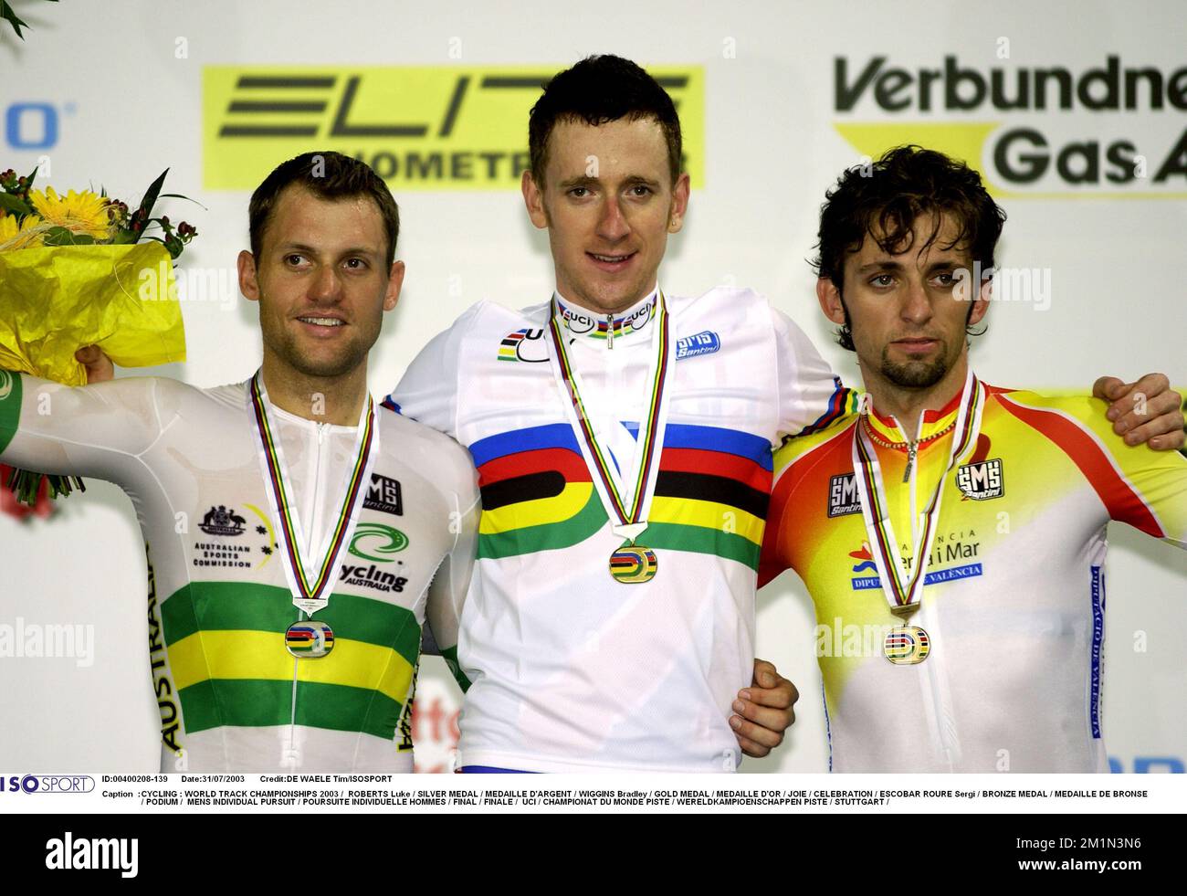 RADFAHREN: WORLD TRACK CHAMPIONSHIPS 2003 / ROBERTS LUKE / SILBERMEDAILLE / MEDAILLE D'ARGENT / WIGGINS BRADLEY / GOLDMEDAILLE / MEDAILLE D'OR / JOIE / CELEBRATION / ESCOBAR ROURE SERGI / BRONZEMEDAILLE / MEDAILLE DE BRONSE / PODIUM / INDIVIDUALVERSUCH FÜR HERREN / POURSUITE HOMMES / FINAL / INDIVIDUALVERMITTLUNGEN FINALE / UCI / CHAMPIONAT DU MONDE PISTE / WERELDKAMPIOENSCHAPPEN PISTE / STUTTGART / Stockfoto