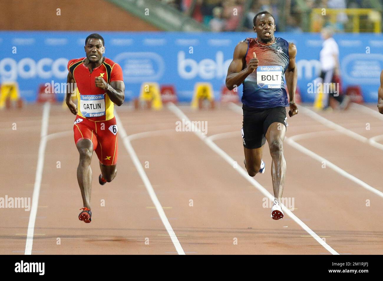 Jamaikas Usain Bolt gewinnt die Men 100m-Veranstaltung vor dem vierten Platz von US Justin Gatlin beim Memorial Van Damme Athletics Meeting, der letzten Etappe der IAAF Diamond League, im King-Baudouin-Stadion (Boudewijnstadion/Stade ROI Baudouin) in Brüssel, Freitag, den 06. September 2013. BELGA FOTO BRUNO FAHY Stockfoto