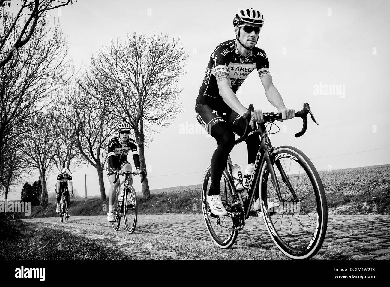 Belgischer Tom Boonen vom Team Omega Pharma - Quick Step in Aktion während einer Aufklärung der Rennstrecke für das eintägige Radrennen „Ronde van Vlaanderen - Tour des Flandres - Tour of Flanders“ am nächsten Sonntag in Oudenaarde, Belgien. Stockfoto