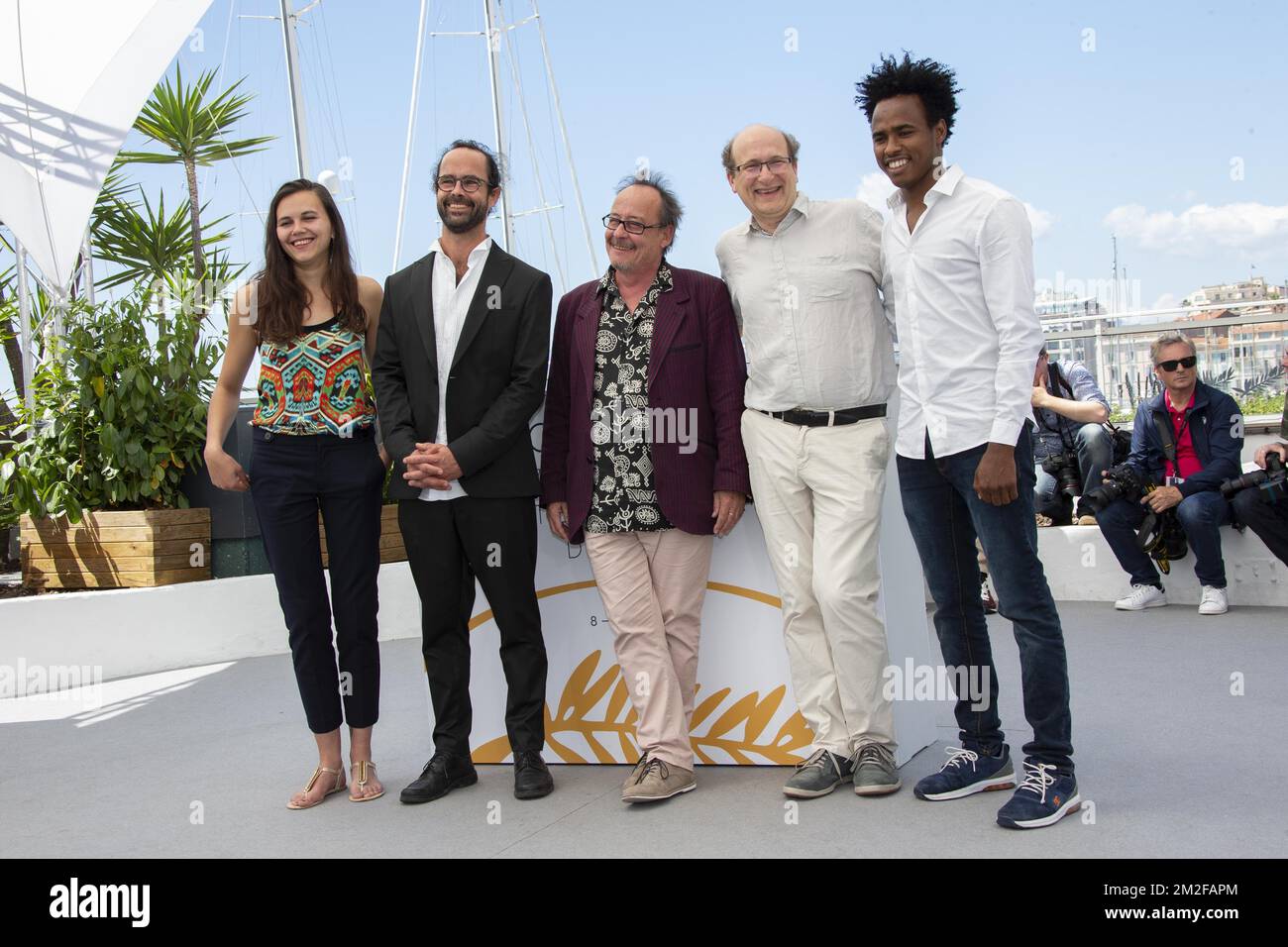 Michel TOESCA, Cedric Herrou and guests attends the 'Libre' Photocall during the 71st annual Cannes Film Festival at Palais des Festivals | Michel TOESCA, Cedric Herrou et des invités assistent au Photocall de 'Libre' lors du 71ème Festival de Cannes au Palais des Festivals. 18/05/2018 Stockfoto