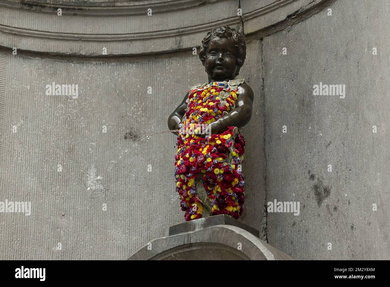 Die Manneken Pis-Statue in Blumen anlässlich der Blumenzeit, im Zentrum von Brüssel, Montag, den 12. August 2019. BELGA FOTO JAMES ARTHUR GEKIERE Stockfoto