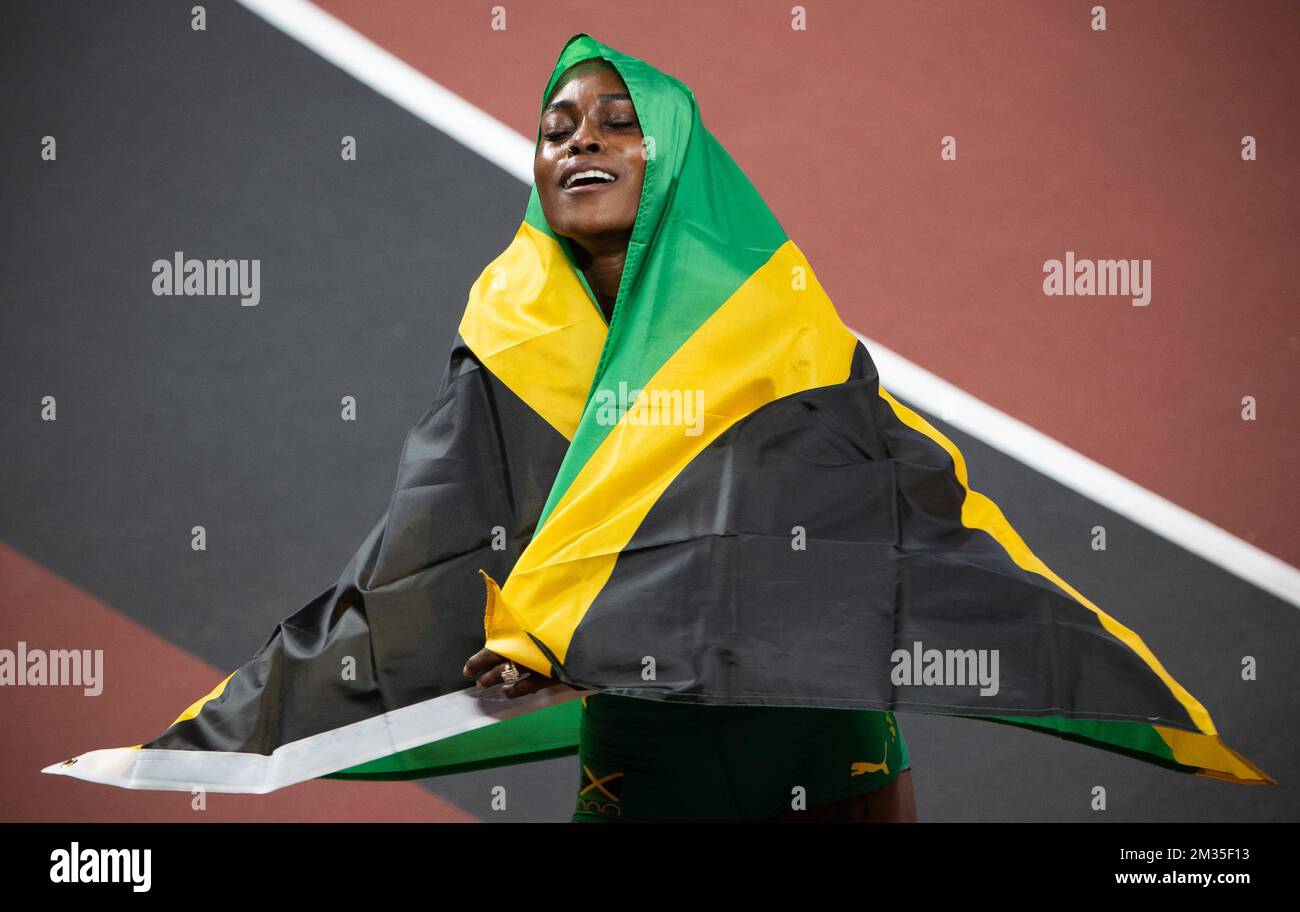 Jamaikas Elaine Thompson-Herah feiert nach dem Gewinn des 100m-Sprint-Events der Frauen am 9. Tag der „Olympischen Spiele 2020 in Tokio“ am Samstag, dem 31. Juli 2021. Die verschoben Olympischen Sommerspiele 2020 finden vom 23. Juli bis zum 8. August 2021 statt. BELGA FOTO BENOIT DOPPPAGNE Stockfoto