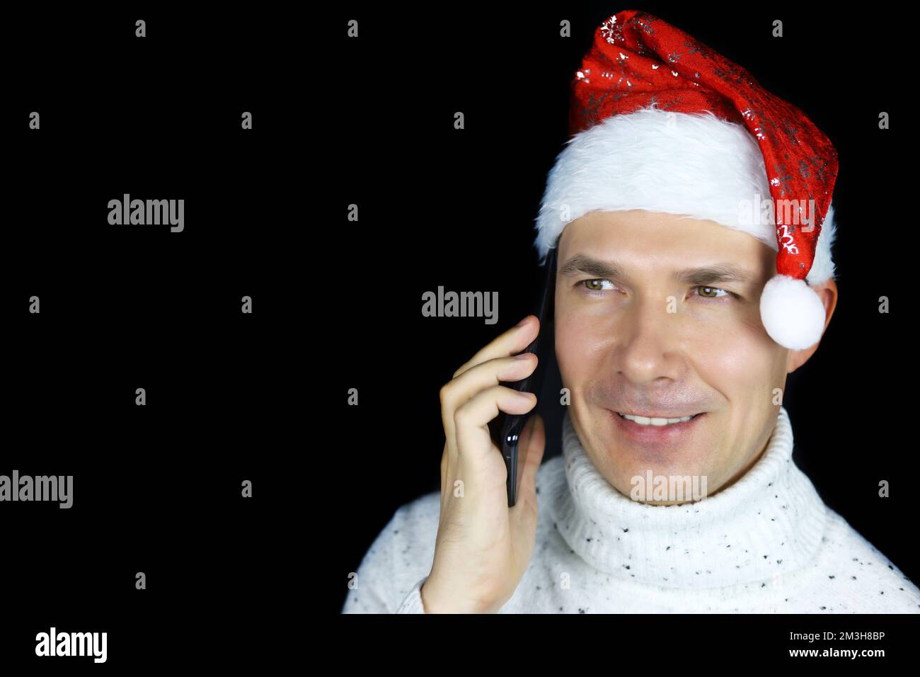 Christmas mobile phone santa hat -Fotos und -Bildmaterial in hoher  Auflösung – Alamy