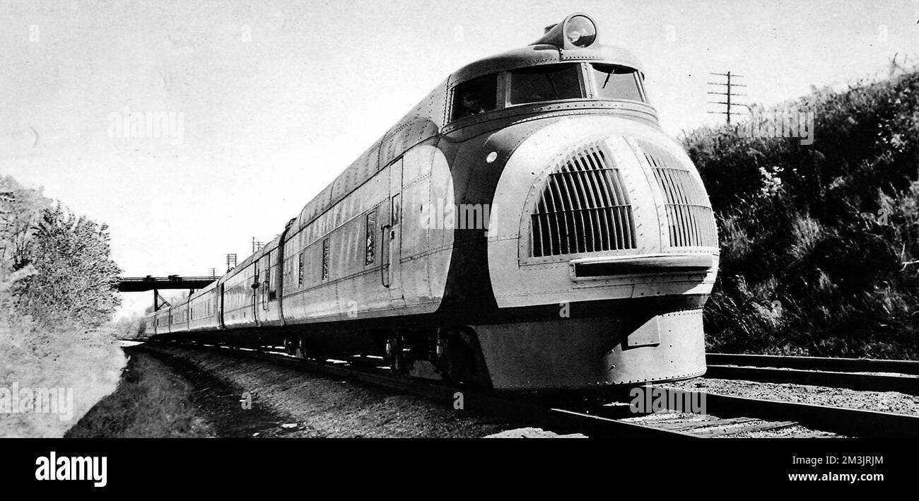 Der Streamline Union Pacific Train für den Hochgeschwindigkeits-Personenverkehr. Diese ölbetriebene dieselelektrische Lokomotive ist mit einem 12-Zylinder-Dieselmotor mit 900 PS ausgestattet. Der Zug brach die amerikanischen Bahnrekorde, indem er von Los Angeles nach New York (3334 Meilen) in 56 Stunden und 55 Minuten mit durchschnittlich 62 km/h und einer Höchstgeschwindigkeit von 120 mhp fuhr. 8.. Dezember 1934 Stockfoto