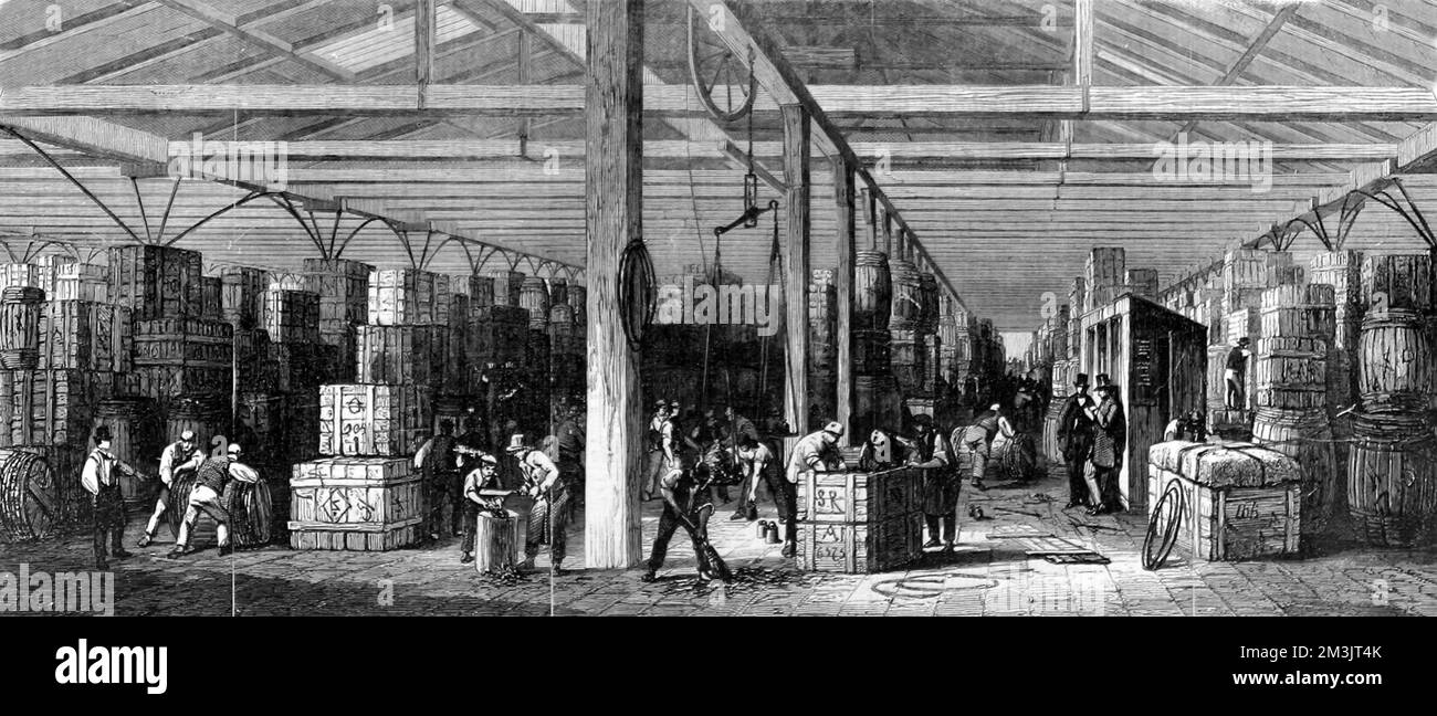 Das größere der beiden Tabaklager an den Londoner Docks im Jahr 1856, in denen Kisten mit Tabakblättern in Reihen gestapelt sind. Datum: 1856 Stockfoto