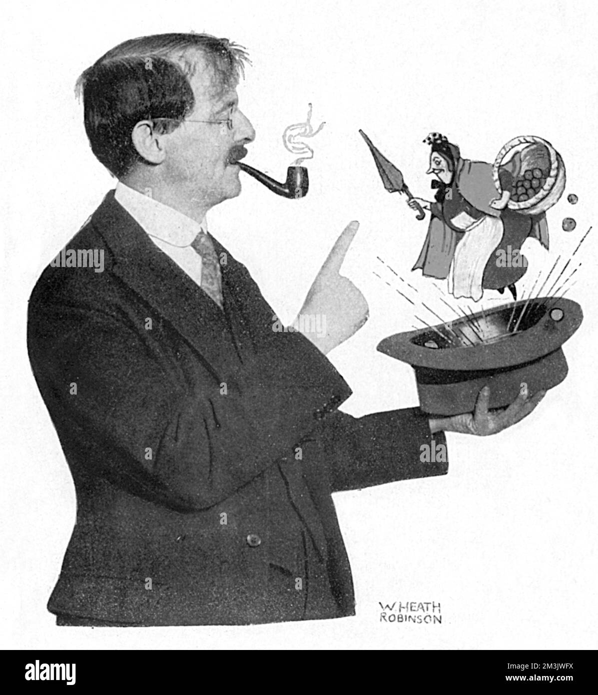 William Heath Robinson mit einer Figur, die von ihm geschaffen wurde. Stockfoto
