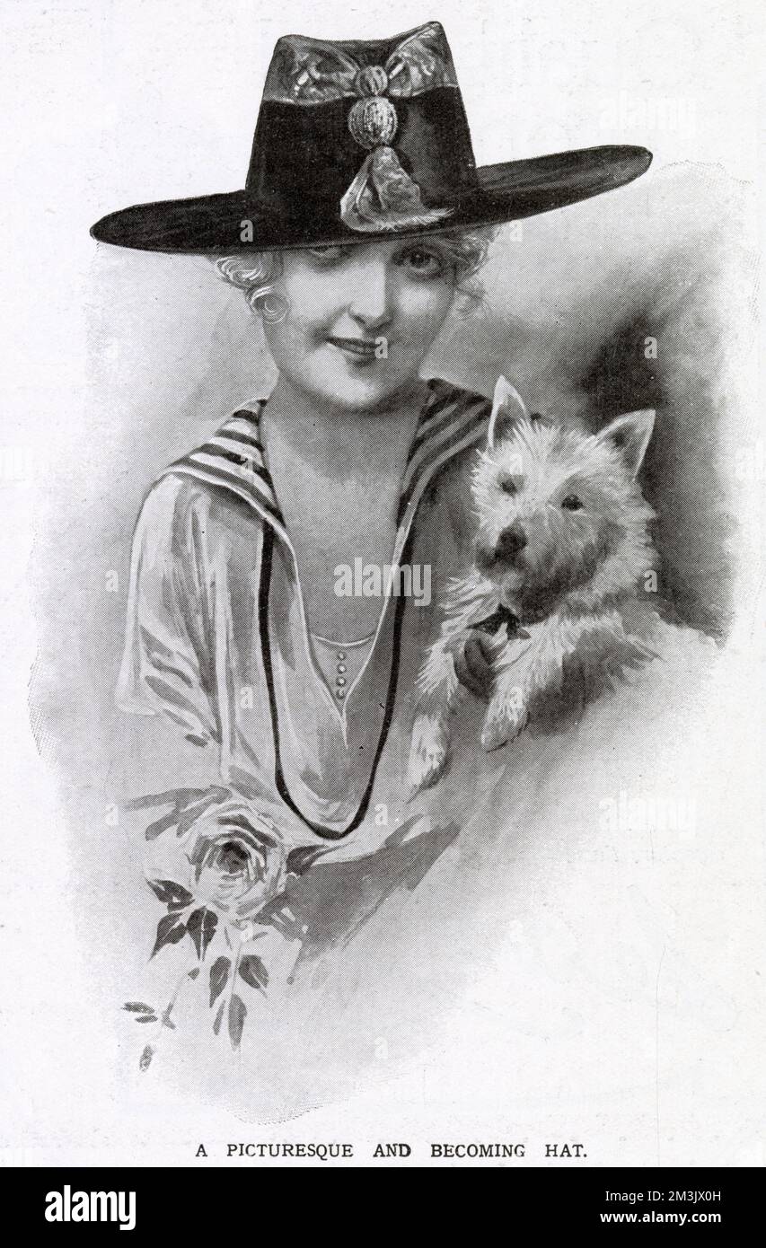 Eine Frau hält einen Hund in der Hand, der einen Hut aus schwarzem Taft trägt, mit einer Krone aus beigefarbenem Moire, deren Enden mit einem Kopfschmuck zusammengefaltet sind. Hut erhältlich von Debenham und Frebody. Stockfoto