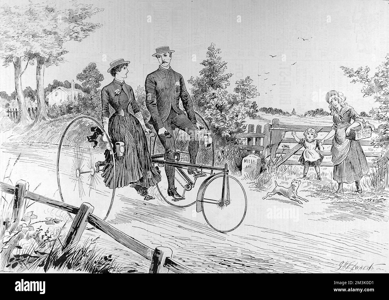 Ein Paar, das auf einem Dreirad auf einer Landstraße fährt. Die Originalunterschrift lautete: „Eine „gesellige“ Fahrt. Stockfoto