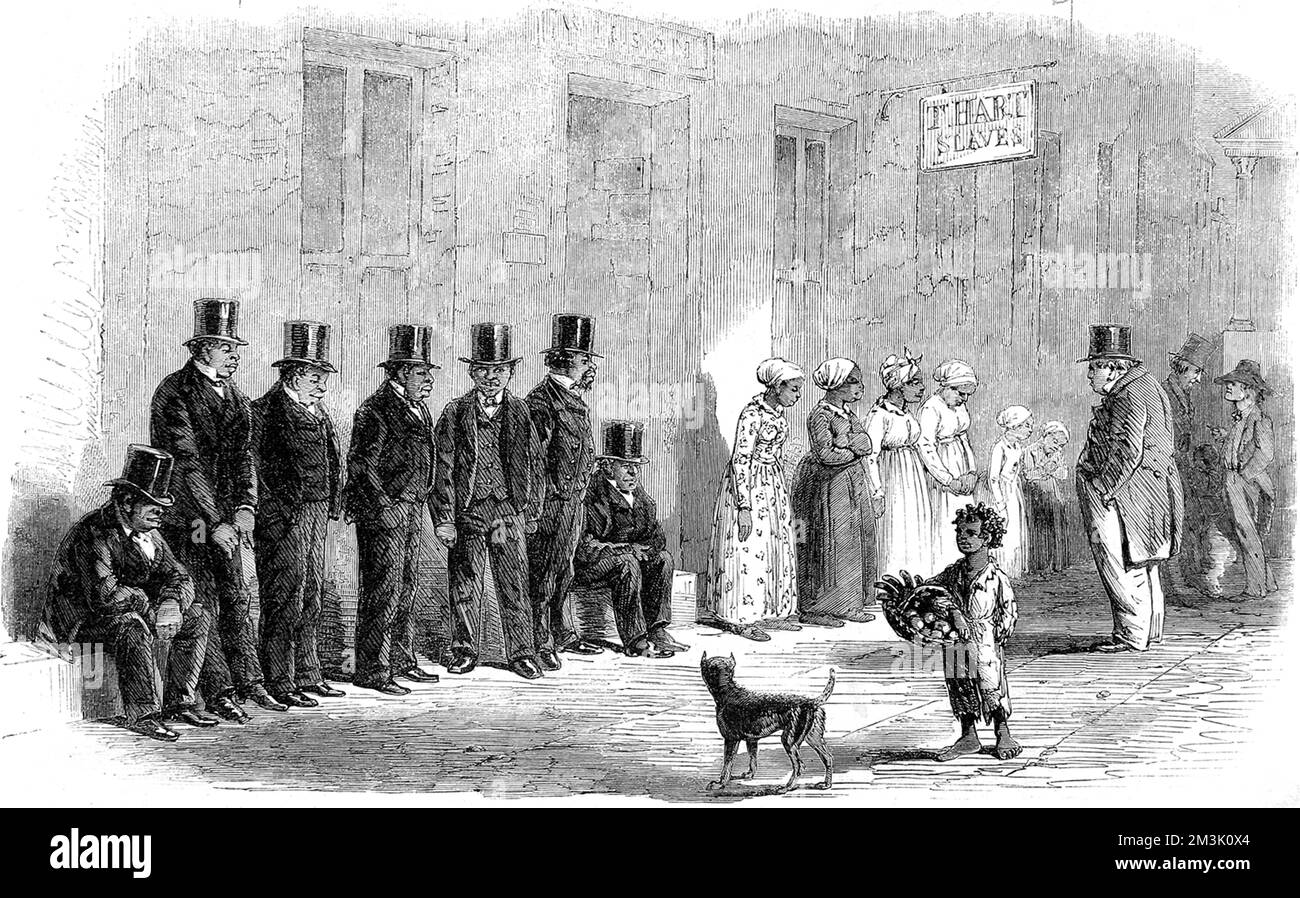 Eine Reihe von Sklaven, die vor der Auktion in New Orleans, USA, 1861 anstanden. Sieben Männer in Hüten und Anzügen, vier Frauen in Calico-Kleider und zwei Kinder sind zum Verkauf bereit. Eine ruhige, trostlose Szene, auf dem Schild über ihren Köpfen steht: "T Hart Sklaven". Stockfoto