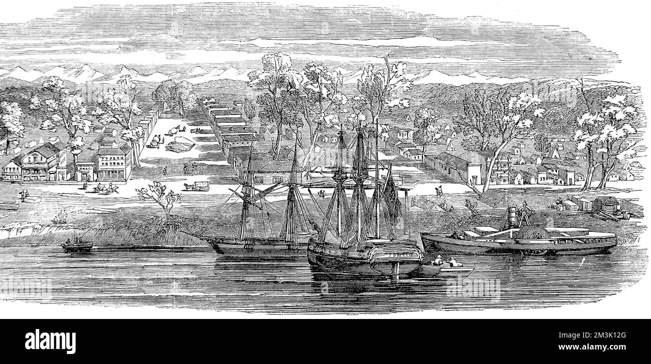 Die Anfänge der Stadt Sacramento wurden in einem Gitter mit weiten Gassen dargestellt. Die Aussicht ist vom Fluss, wo Segelboote und ein Paddeldampfer vor Anker liegen. Datum: 1850 Stockfoto