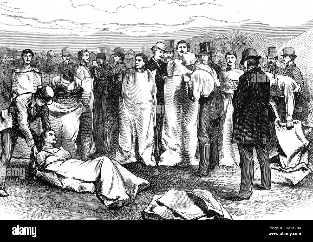 Eine Reihe von Wettkämpfern in einem Sackrennen im Lillie Bridge Stadion in London. 1874 Stockfoto