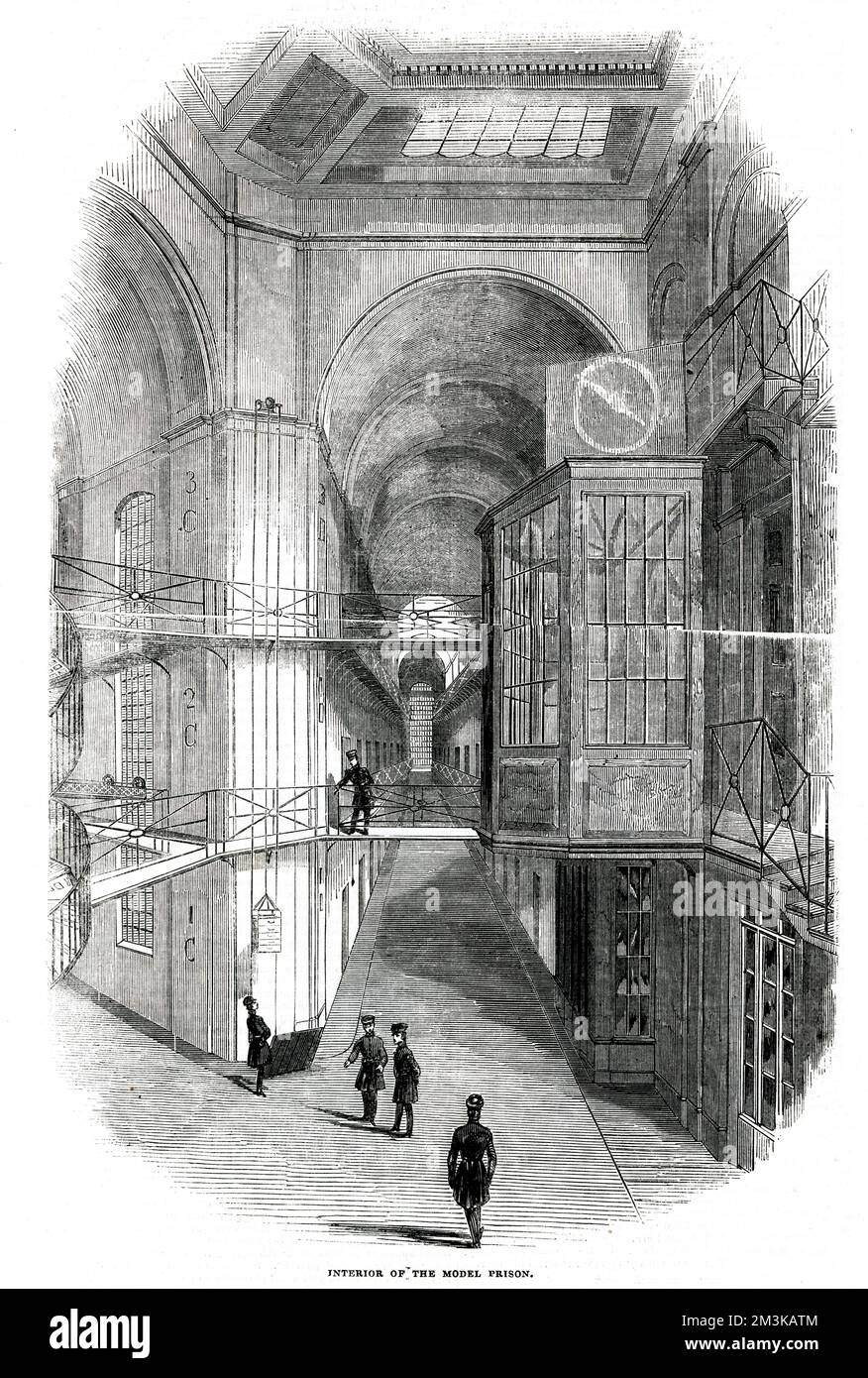 Innenansicht des neu erbauten Gefängnisses Pentonville im Norden Londons mit den Treppen und Galerien, die die Zentralhalle dieses festungsähnlichen Gebäudes durchqueren. Datum: 1843 Stockfoto