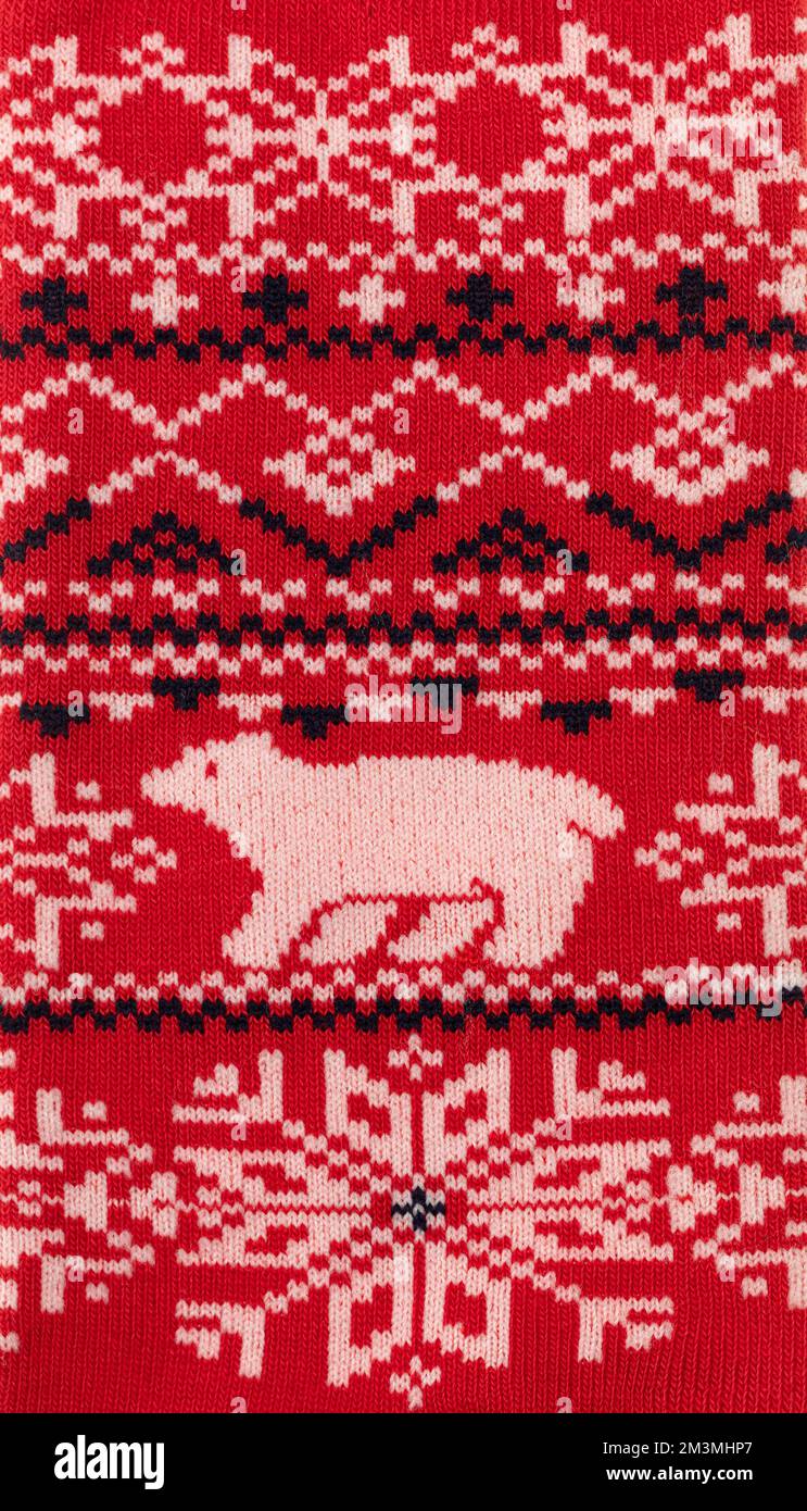 Strickmaterial mit skandinavischen geometrischen Zierelementen Stockfoto