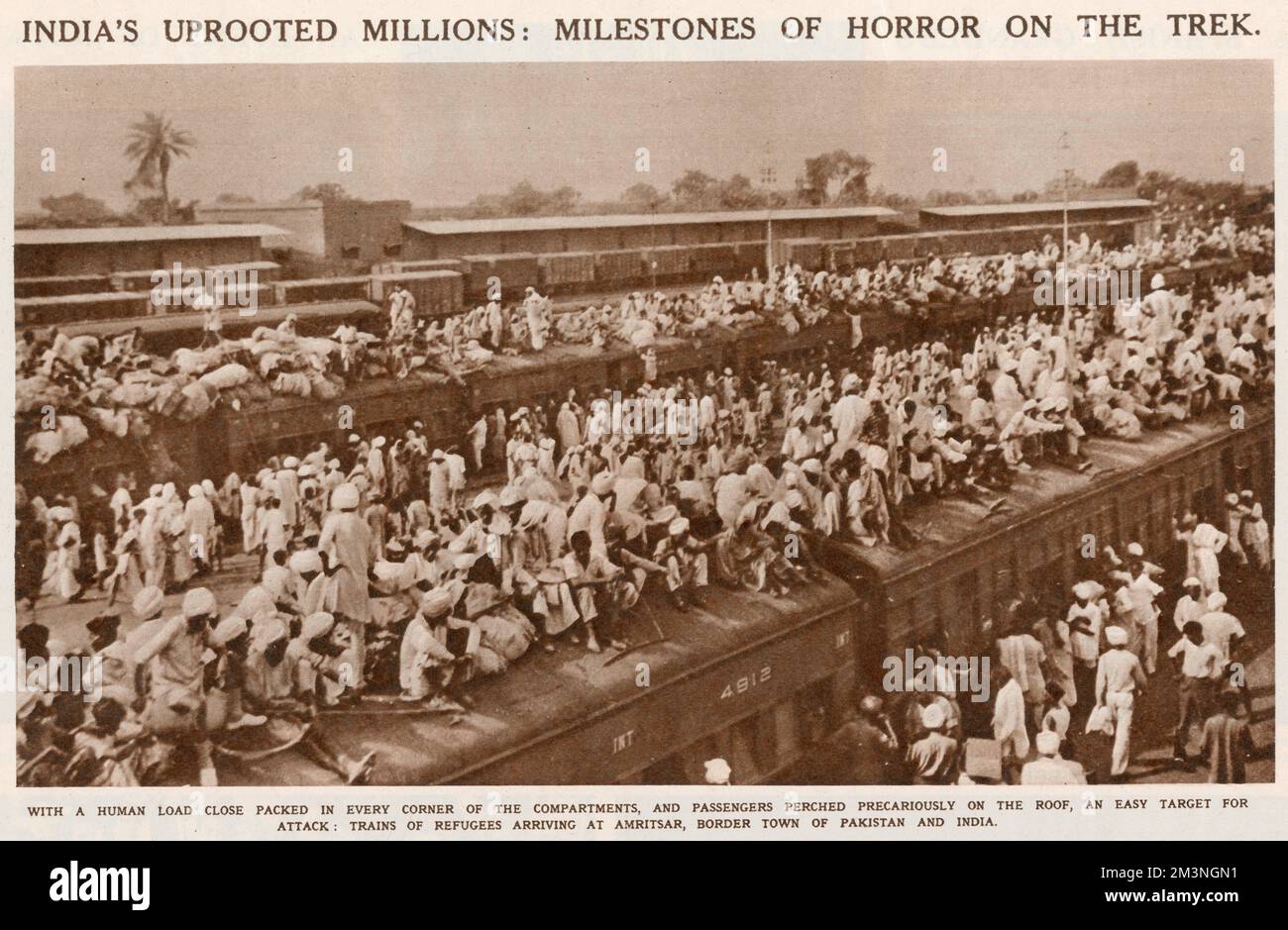 Überfüllte Züge von Flüchtlingen, die nach der Teilung in Amritsar, der Grenzstadt Pakistans und Indiens, ankommen. 1947 Stockfoto