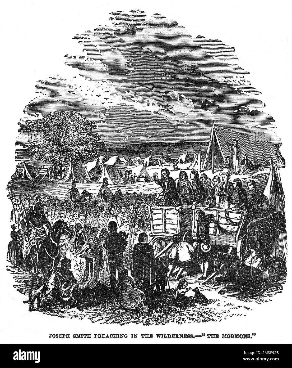 Joseph Smith (1805-1844), amerikanischer religiöser Führer und Gründer des Mormonismus, predigt von einem offenen Karren zu seinen Anhängern, die in der Wildnis lagern. Stockfoto