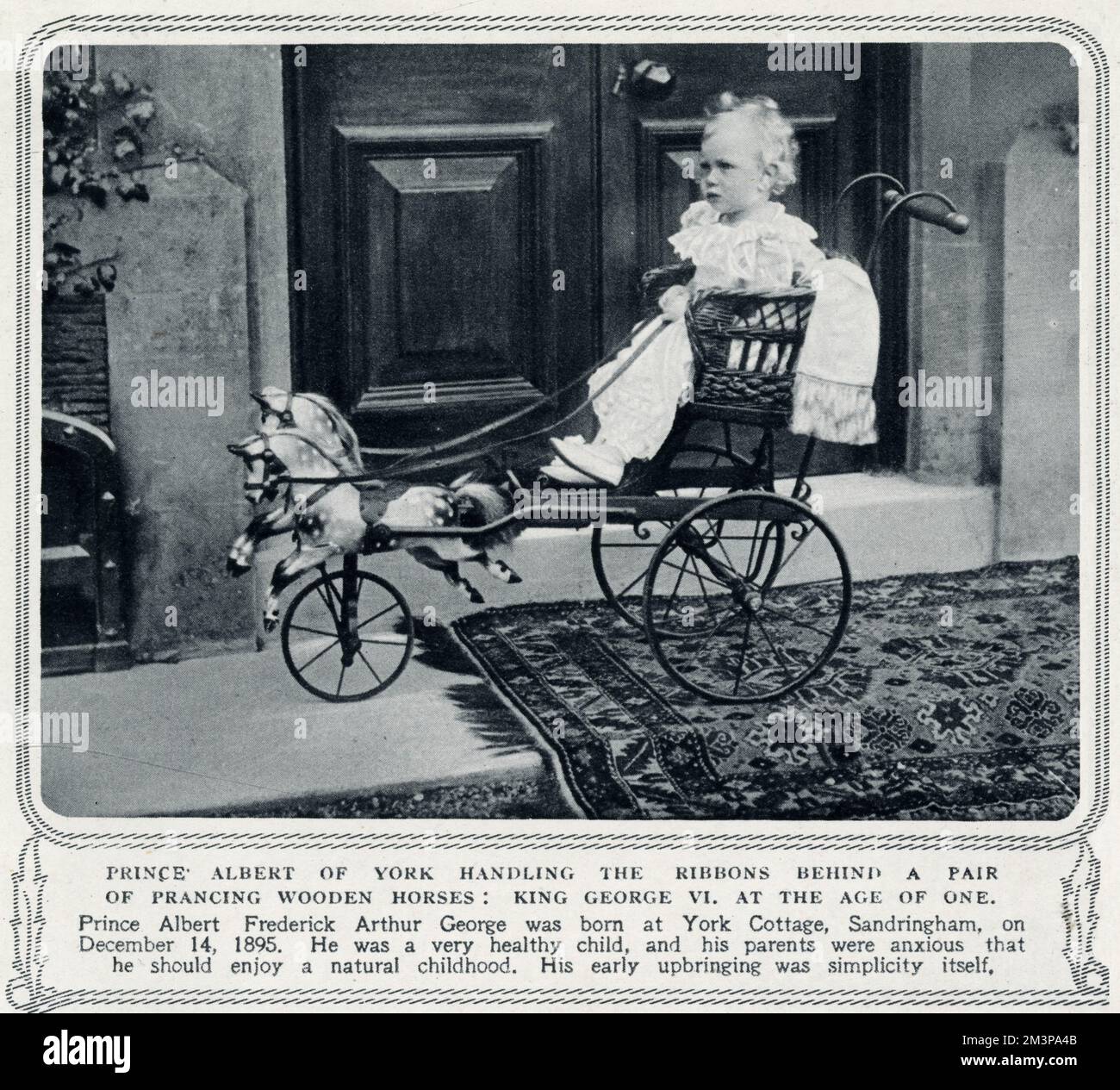 Prinz Albert of York (1895 - 1952), später als „Bertie“ bekannt, später König George VI., Reiten in der Spielzeugkutsche und Holzpferde. 1897 Stockfoto