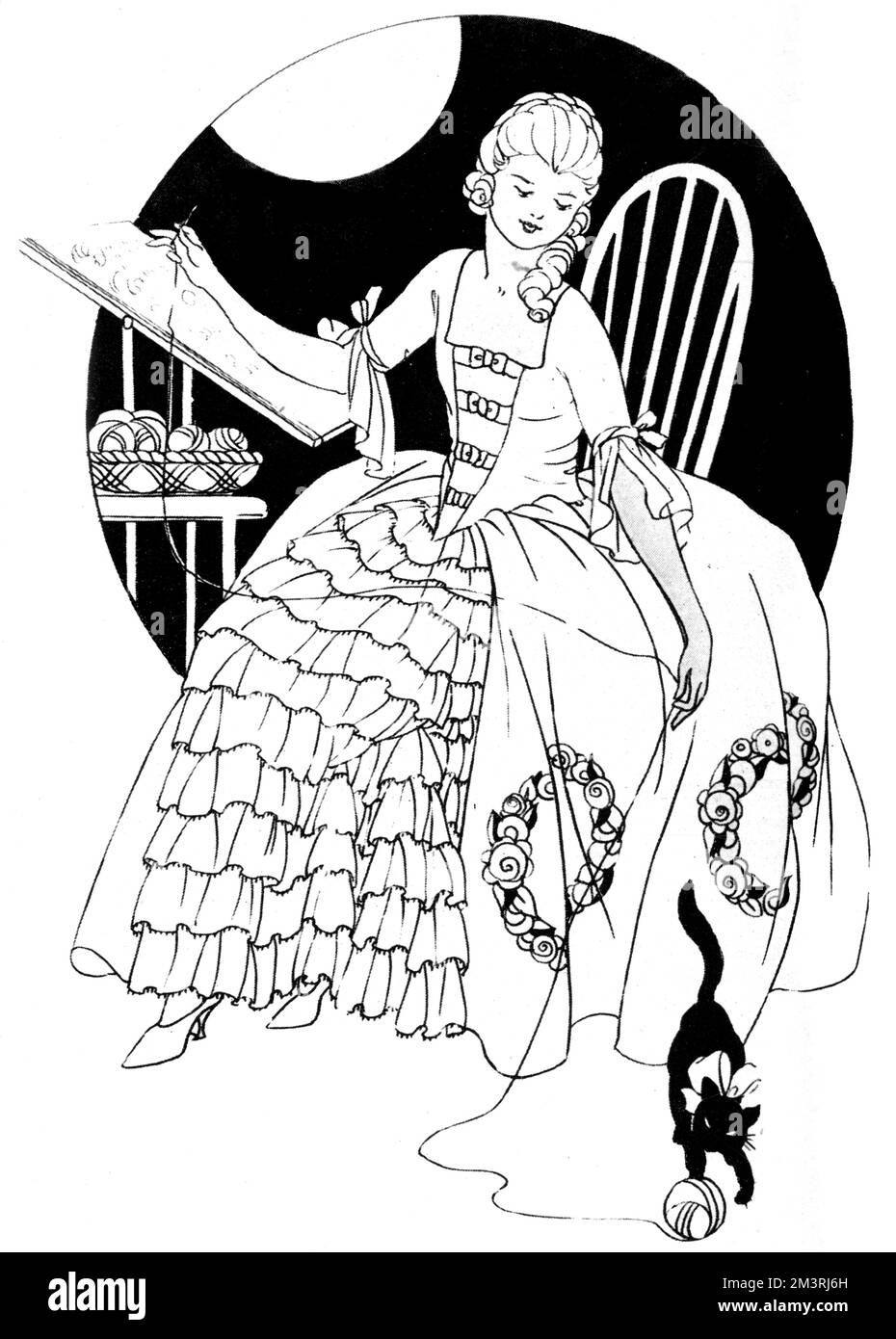 Needlewoman mit einem hübschen, handgefertigten, bestickten Gehrock Stockfoto