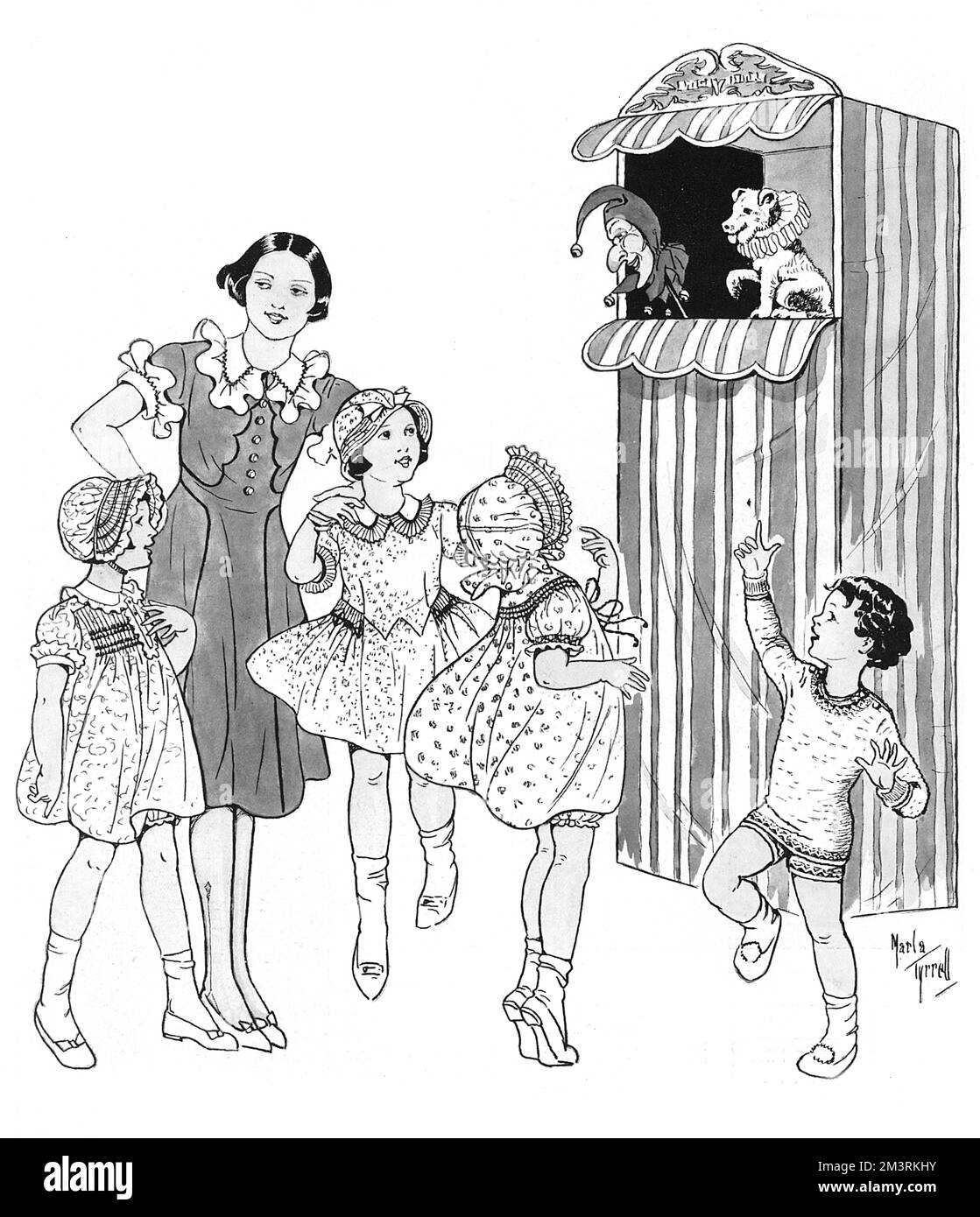 Kinder, die in Moden aus Liberty gekleidet sind, sehen sich mit Spannung eine Punch and Judy Show an. Datum: 1933 Stockfoto