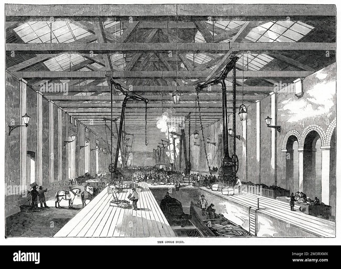 Der Blick auf den Warenschuppen am Bahnhof Kings Cross. Arbeiter, die Waren auf die Boote laden. Datum: 1853 Stockfoto