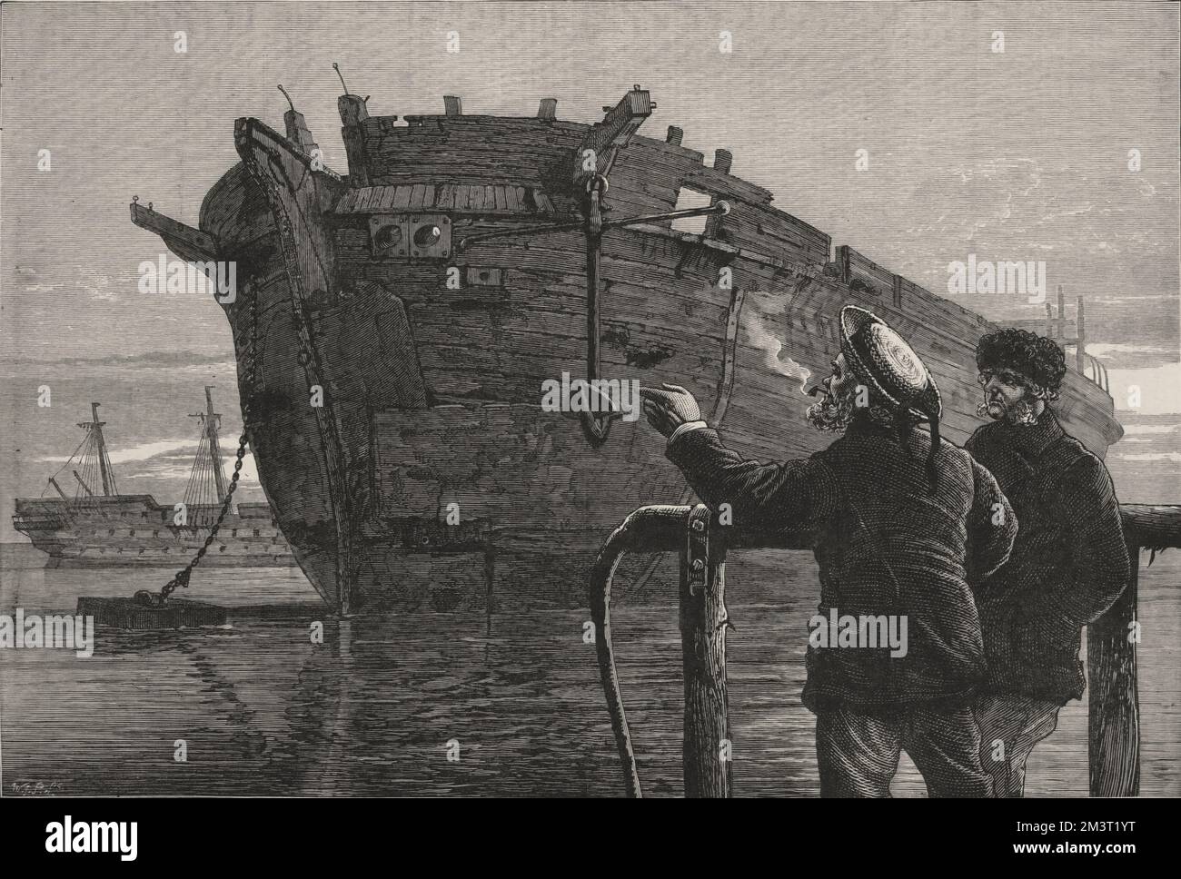 Das alte arktische Forschungsschiff HMS Resolute hat sich in Chatham Dockyard getrennt. Zwei Matrosen betrachten das Wrack. Stockfoto