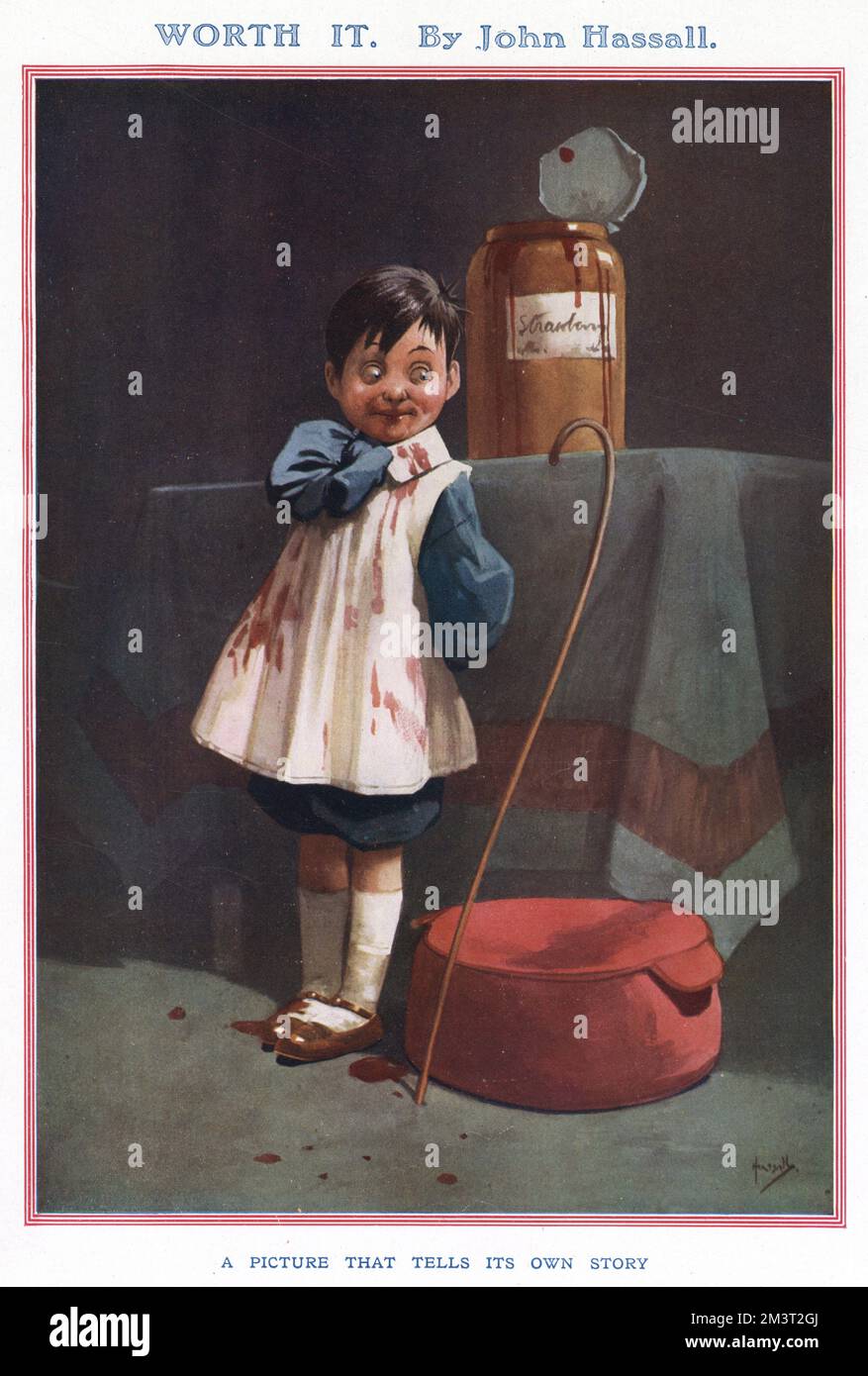 Ein kleiner Junge, der den größten Teil einer Tasse Erdbeermarmelade mit einem Stock und einem Kissen verzehrt hat, bereut nichts. Stockfoto