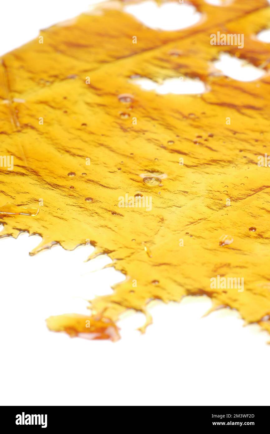 Goldener Cannabisharzextrakt, gelbes Wachsharz. Stockfoto