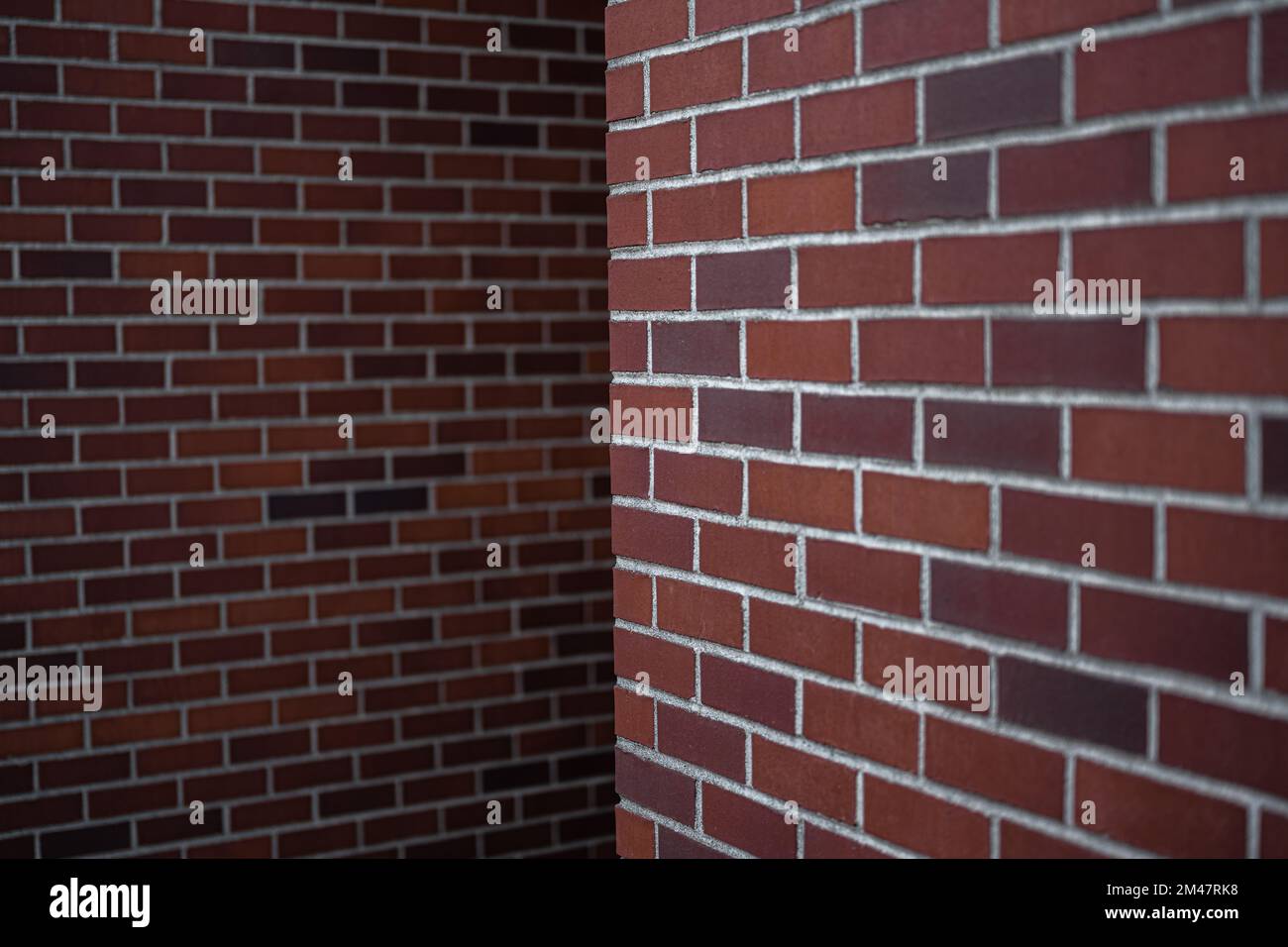 Rote Backsteinmauer in einem Gebäude Stockfoto