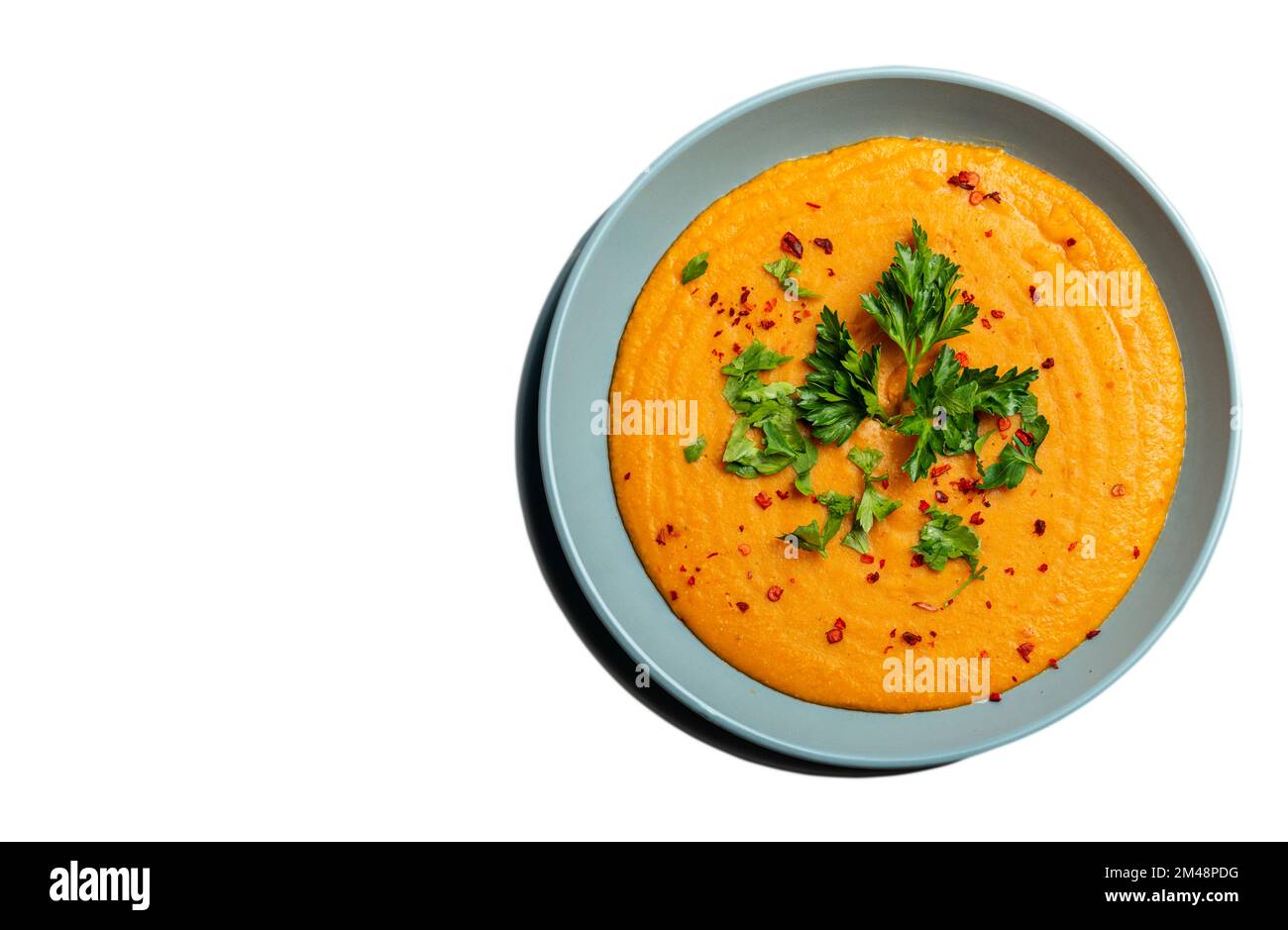 Traditionelle indische Suppenlinsen. Indisches Dhal scharfes Curry in Schüssel Gewürze Kräuter rustikaler isolierter Hintergrund. Authentisches indisches Gericht Stockfoto
