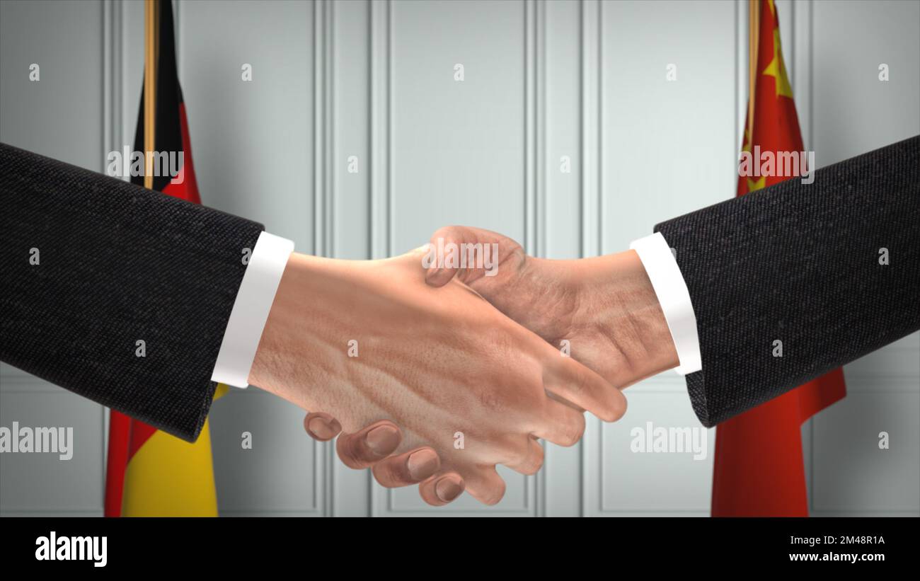 Geschäftstreffen der Beamten in Deutschland und China. Diplomatie-Deal. Partner-Handschlag. Stockfoto