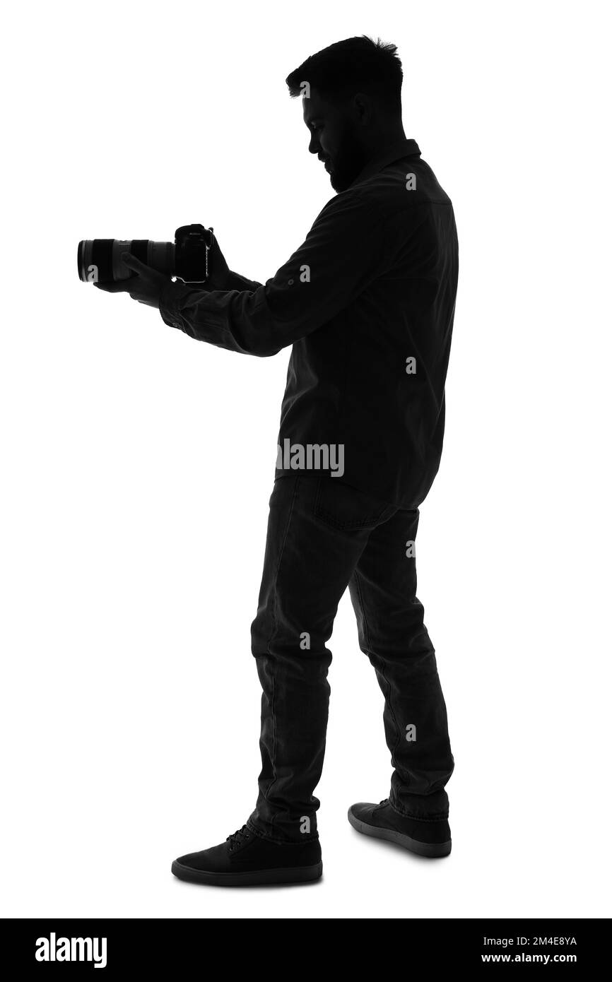 Silhouette eines männlichen Fotografen mit Kamera auf weißem Hintergrund Stockfoto