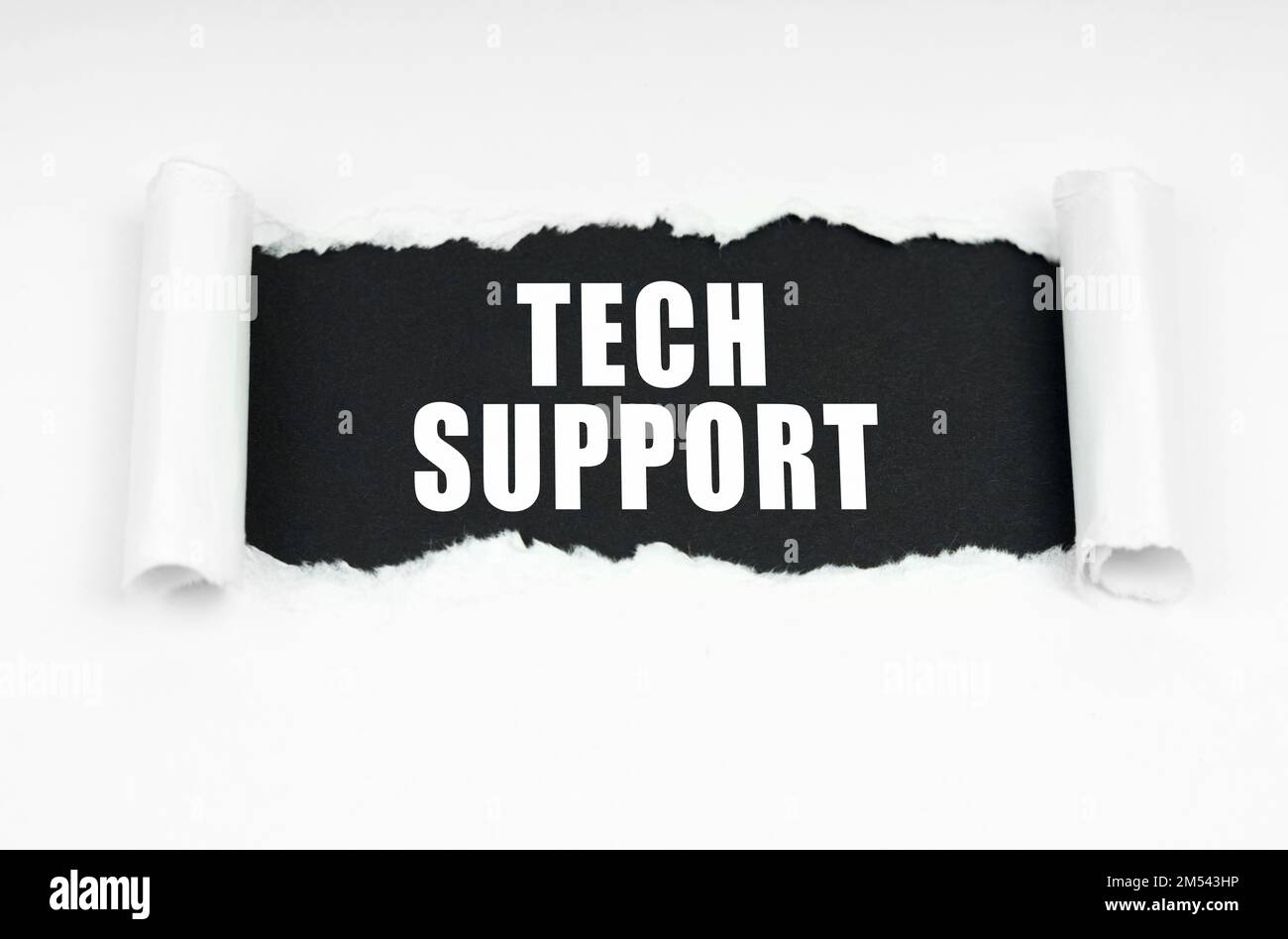 Geschäftskonzept. In der Mitte des weißen Blatts befindet sich ein schwarzer Rahmen mit der Aufschrift „Technischer Support“ Stockfoto