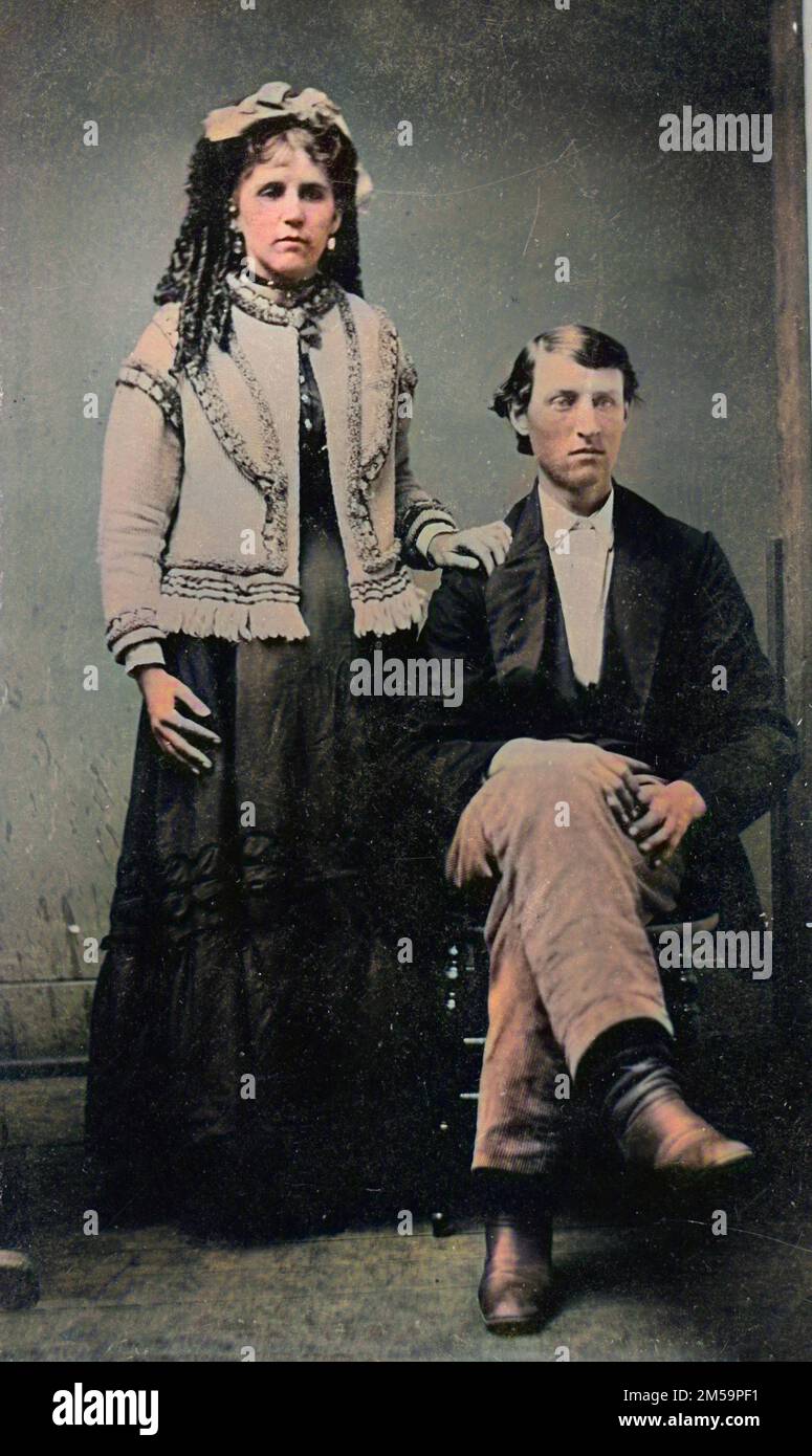 Vintage-Farbfoto eines jungen viktorianischen Ehepaars aus den 1860er Jahren 1870. Stockfoto