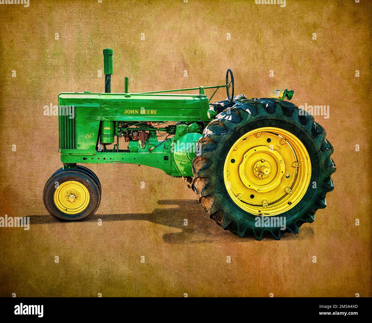 Das John Deere Modell 60 wurde zwischen den Jahren 1952 und 1956 produziert, und es wurden über 50.000 produziert. Dieses gemischte Medienfoto ist ein attraktiver Port Stockfoto