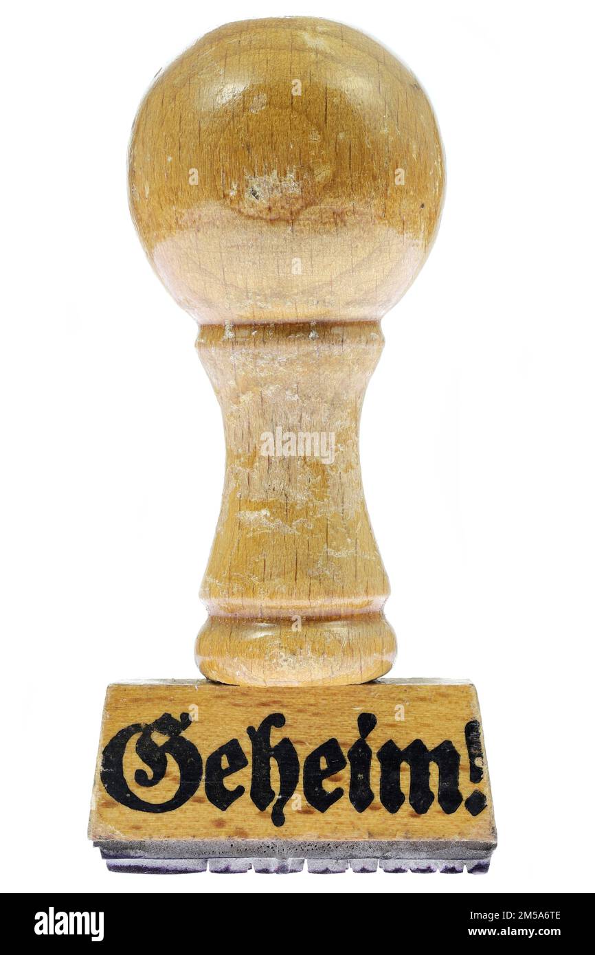 Vintage-Gummistempel mit deutschem Wort „Geheim!“ (Vertraulich) Stockfoto