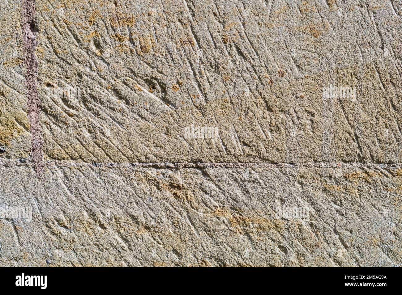 Alte Wandpflasterhintergrundstruktur Stockfoto