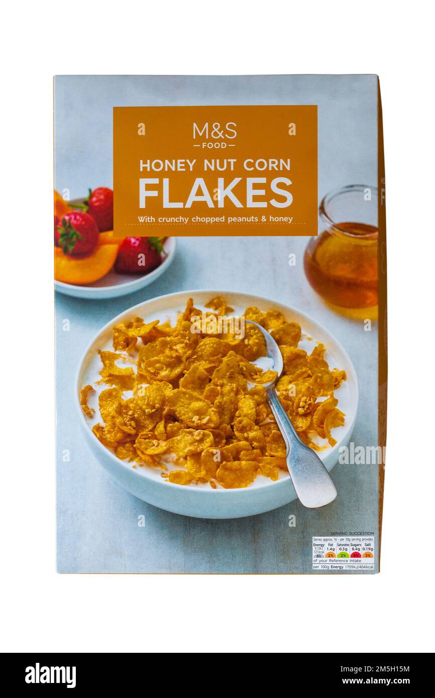 Schachtel Honignuss-Cornflakes mit knusprigen gehackten Erdnüssen und Honiggetreide von M&S, isoliert auf weißem Hintergrund Stockfoto