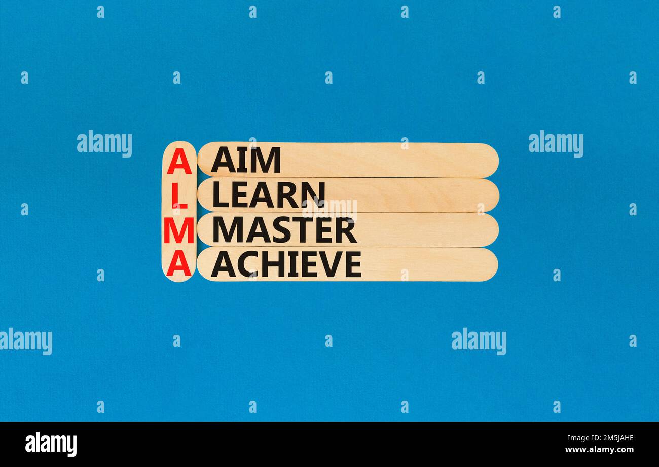 ALMA AIM Lerner Meister erreichen Symbol. Konzeptbegriffe ALMA AIM Lerne Master Achievement auf Holzstäbchen auf einem wunderschönen blauen Hintergrund. Business ALMA AIM lear Stockfoto
