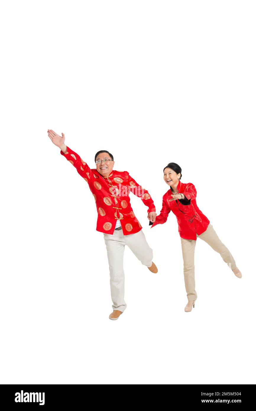 Frohes chinesisches Neujahrskostüm für ältere Paare Stockfoto