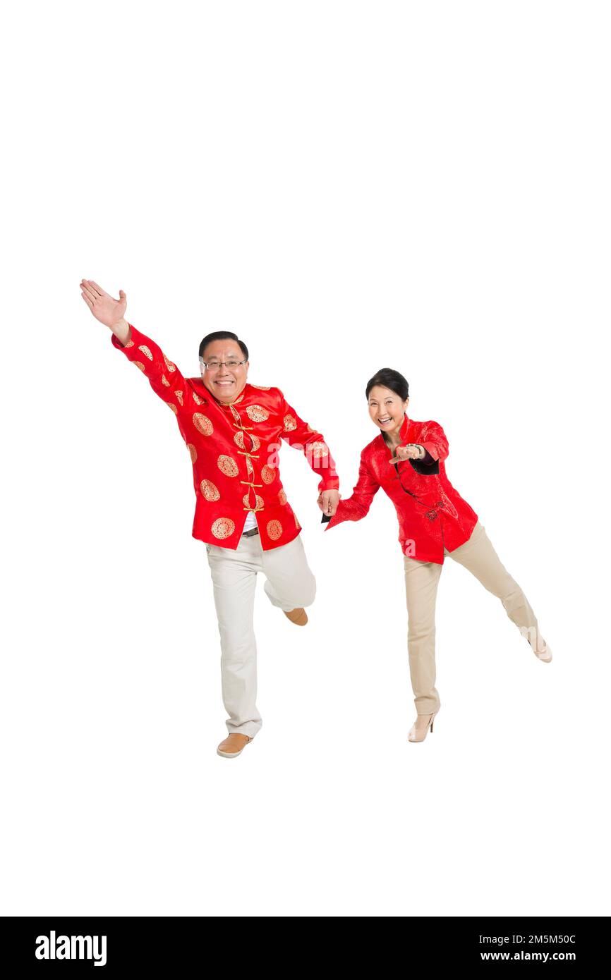 Frohes chinesisches Neujahrskostüm für ältere Paare Stockfoto