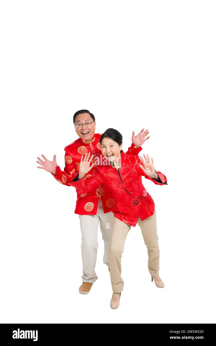 Frohes chinesisches Neujahrskostüm für ältere Paare Stockfoto